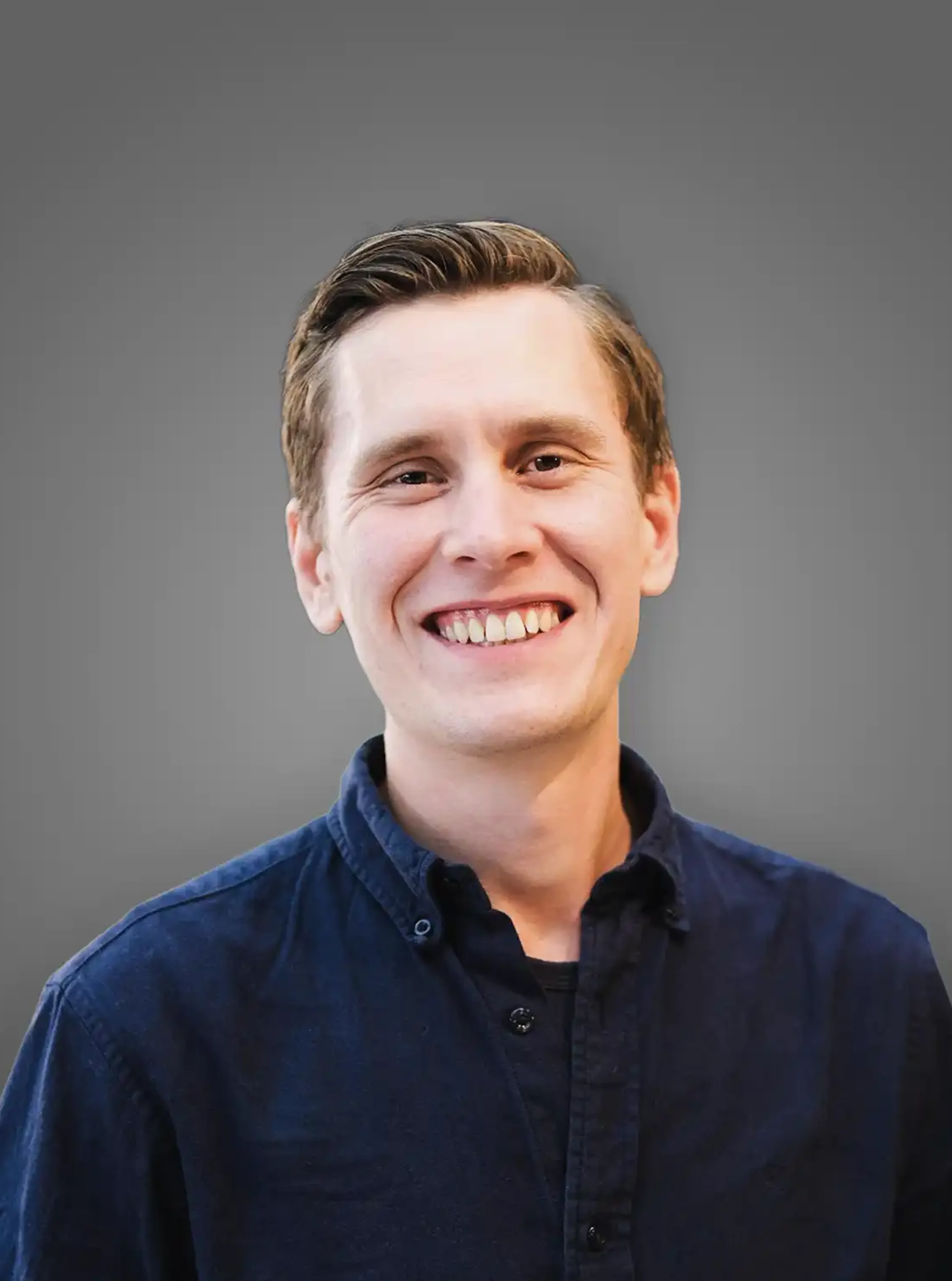Smiling man with a blue shirt