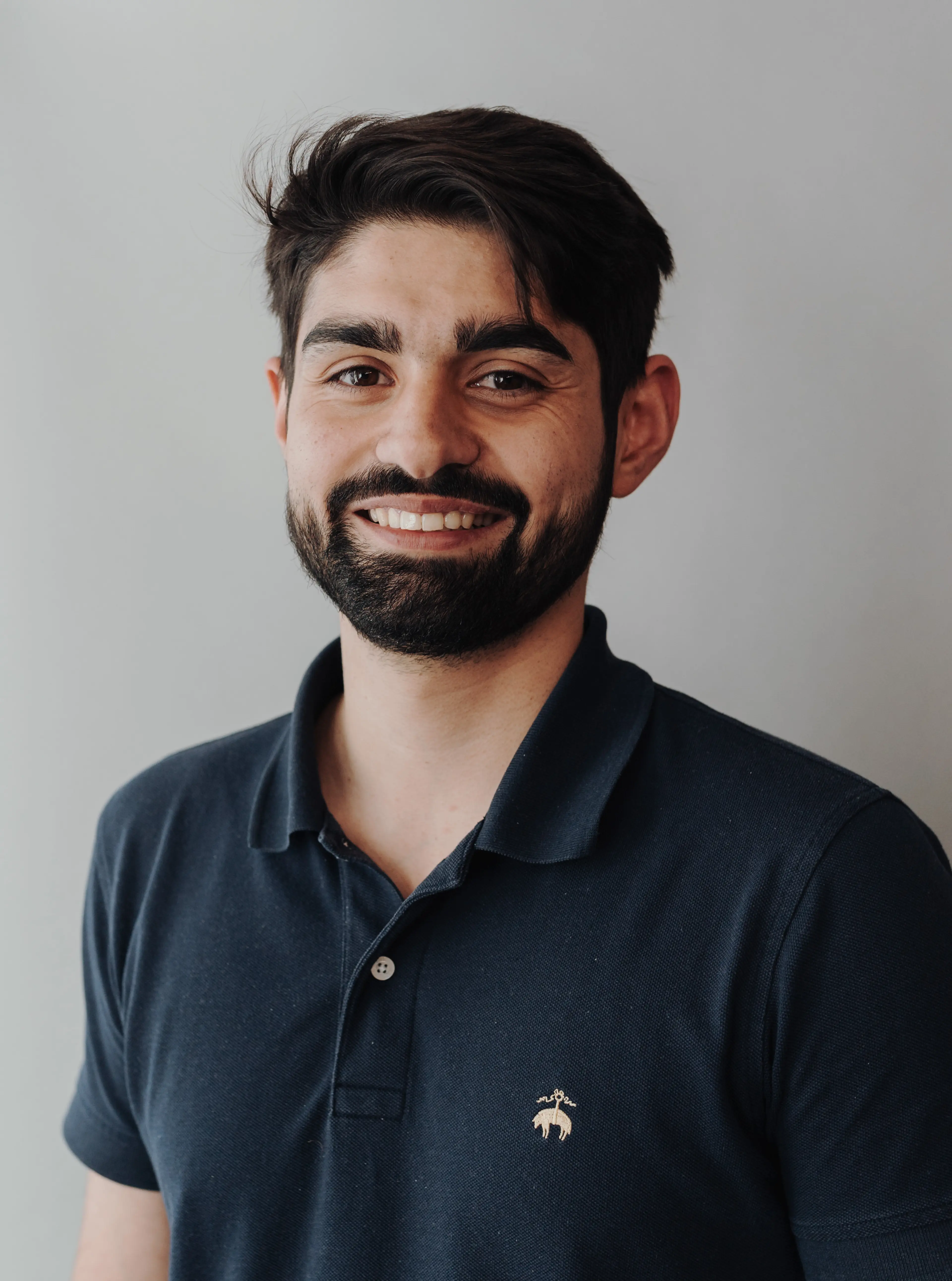 Man wearing a blue shirt.