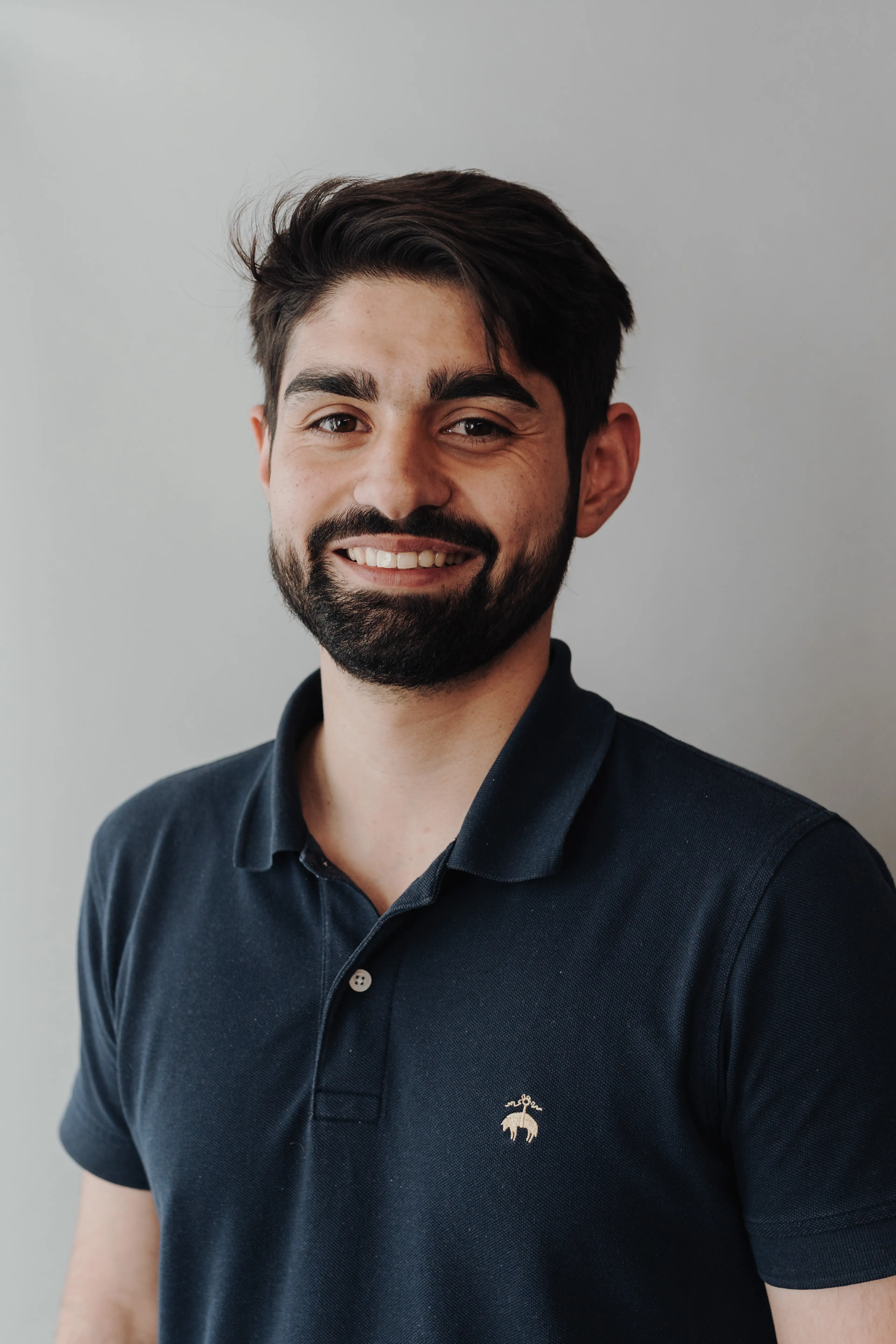 Man wearing a blue shirt.