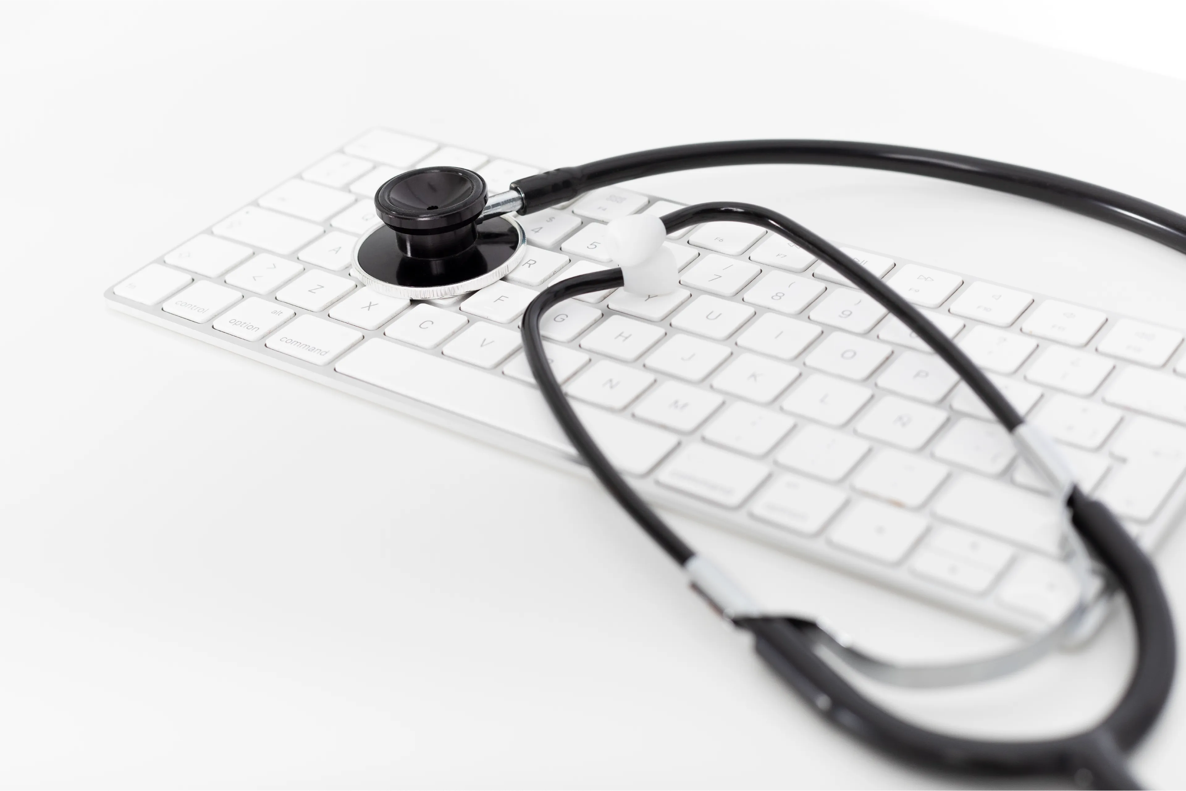 keyboard with healthcare item to symbolise digital transformation in the health sector