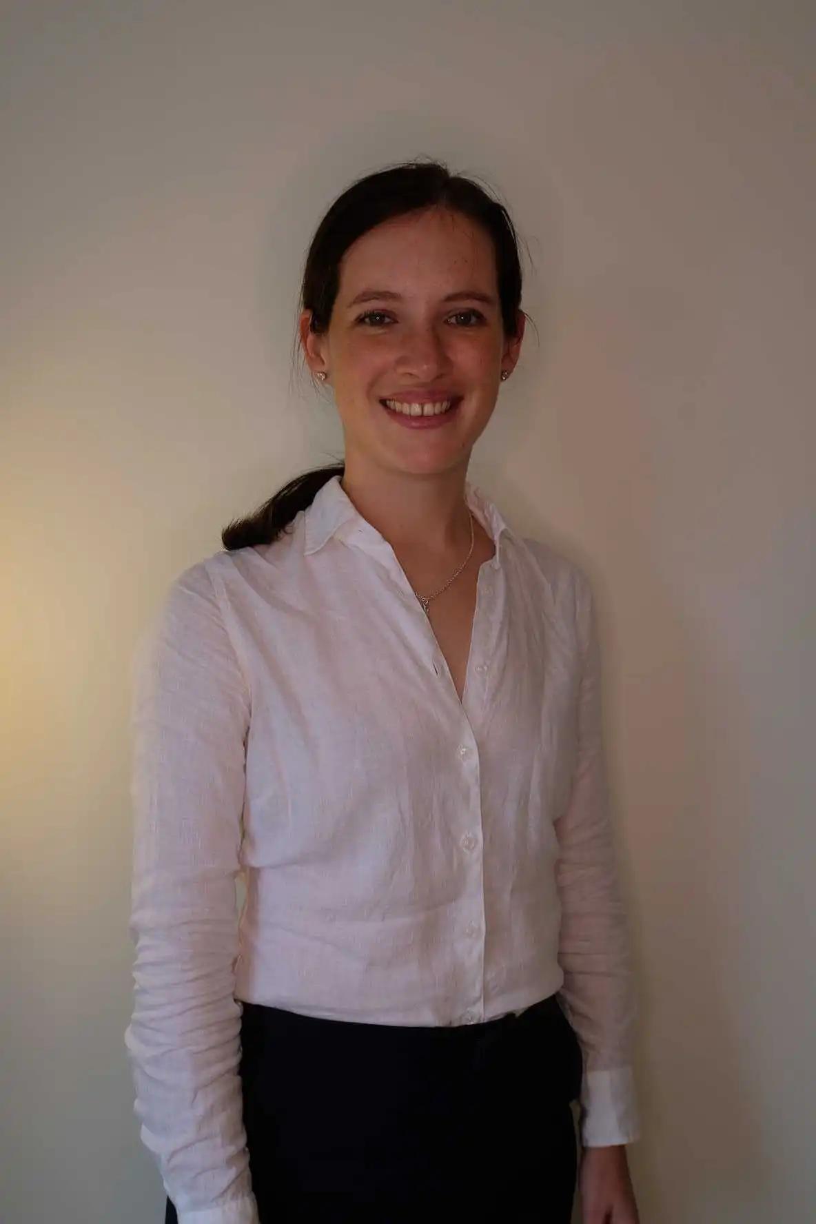 Smiling woman with a white shirt