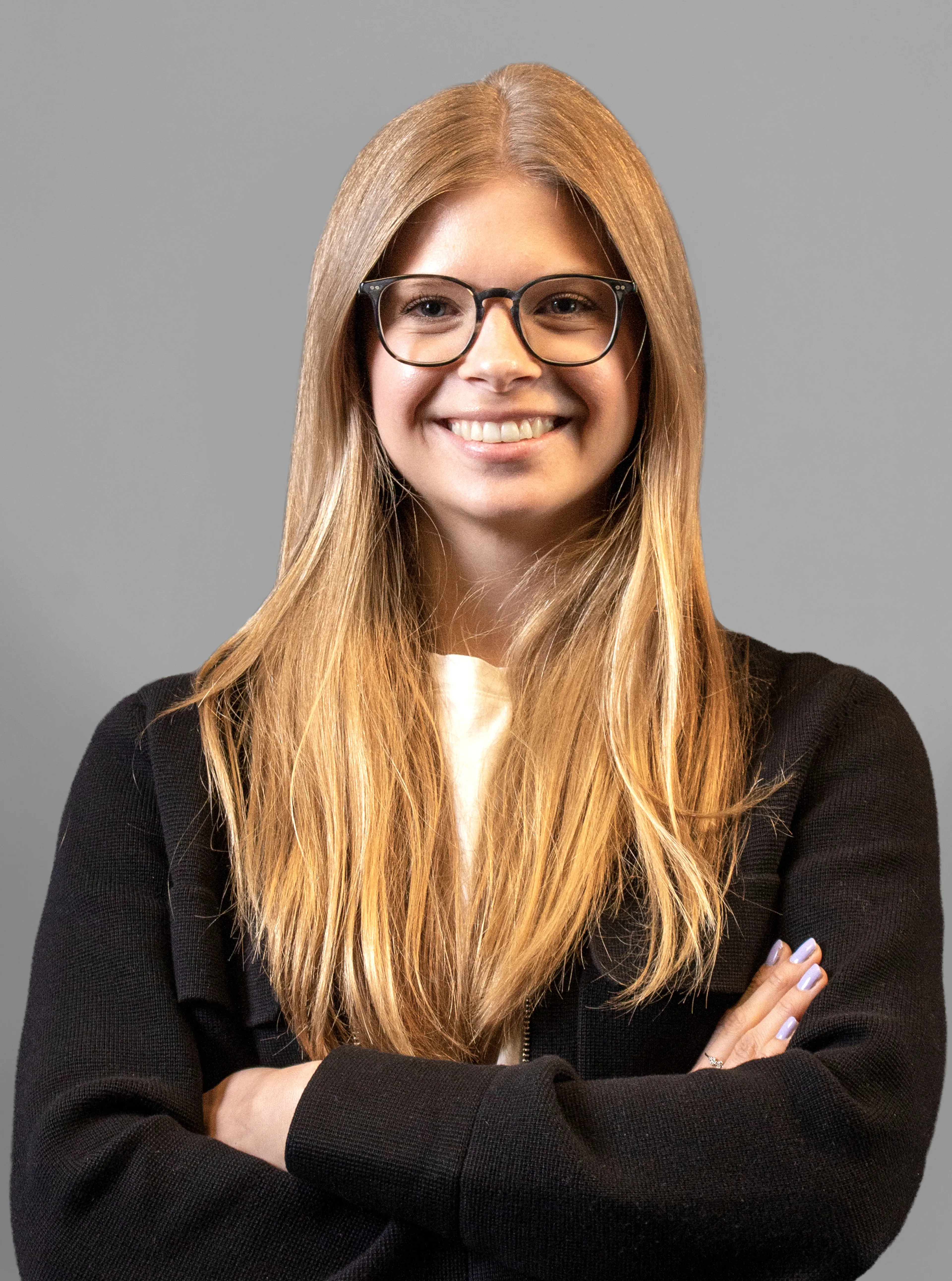 Woman with glasses with long blond hair