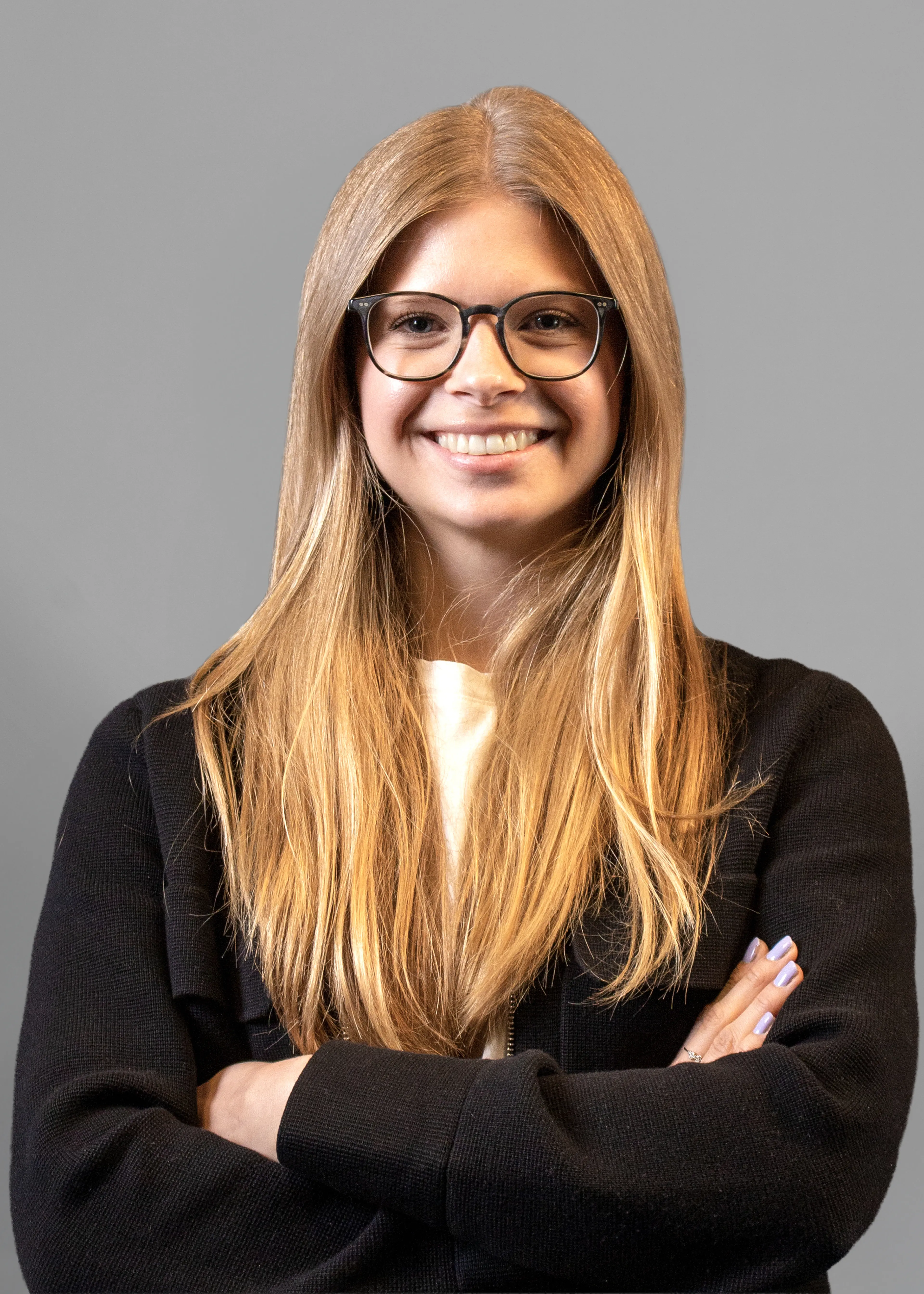 Woman with glasses with long blond hair