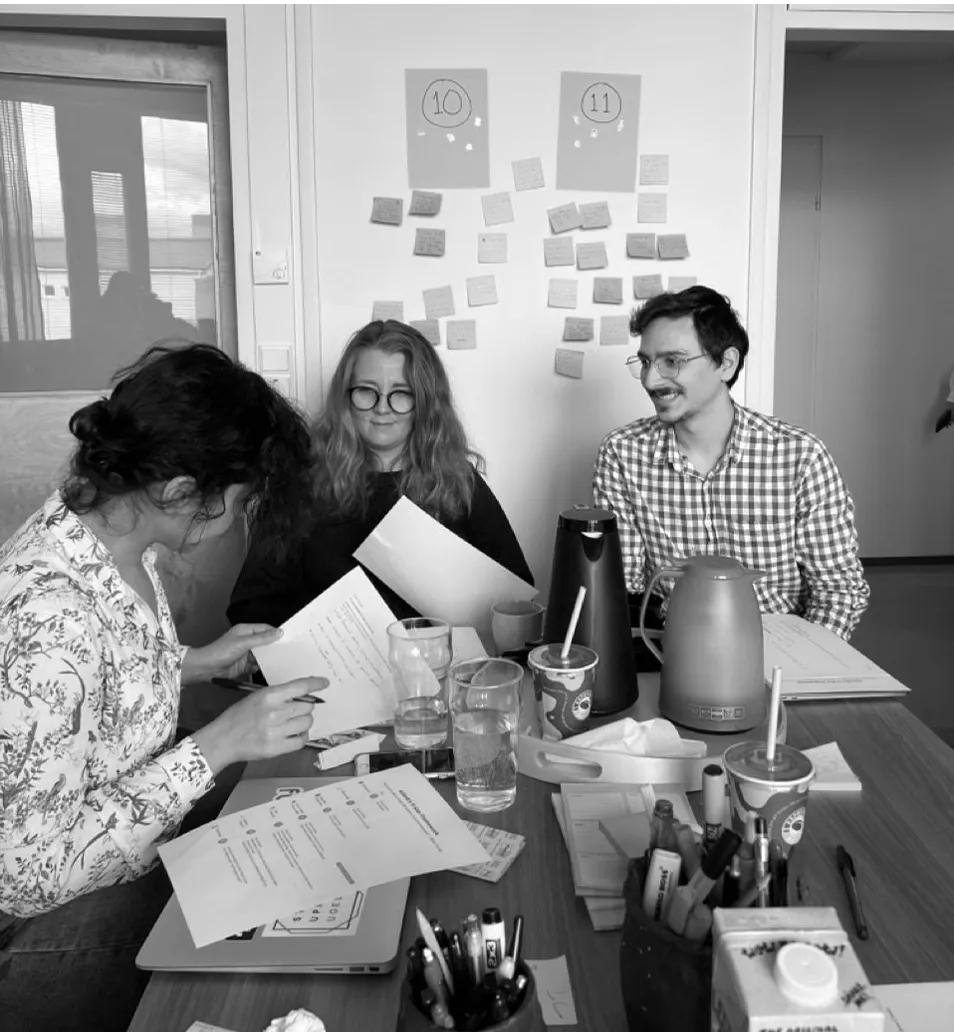 People sitting together discussing and workshopping