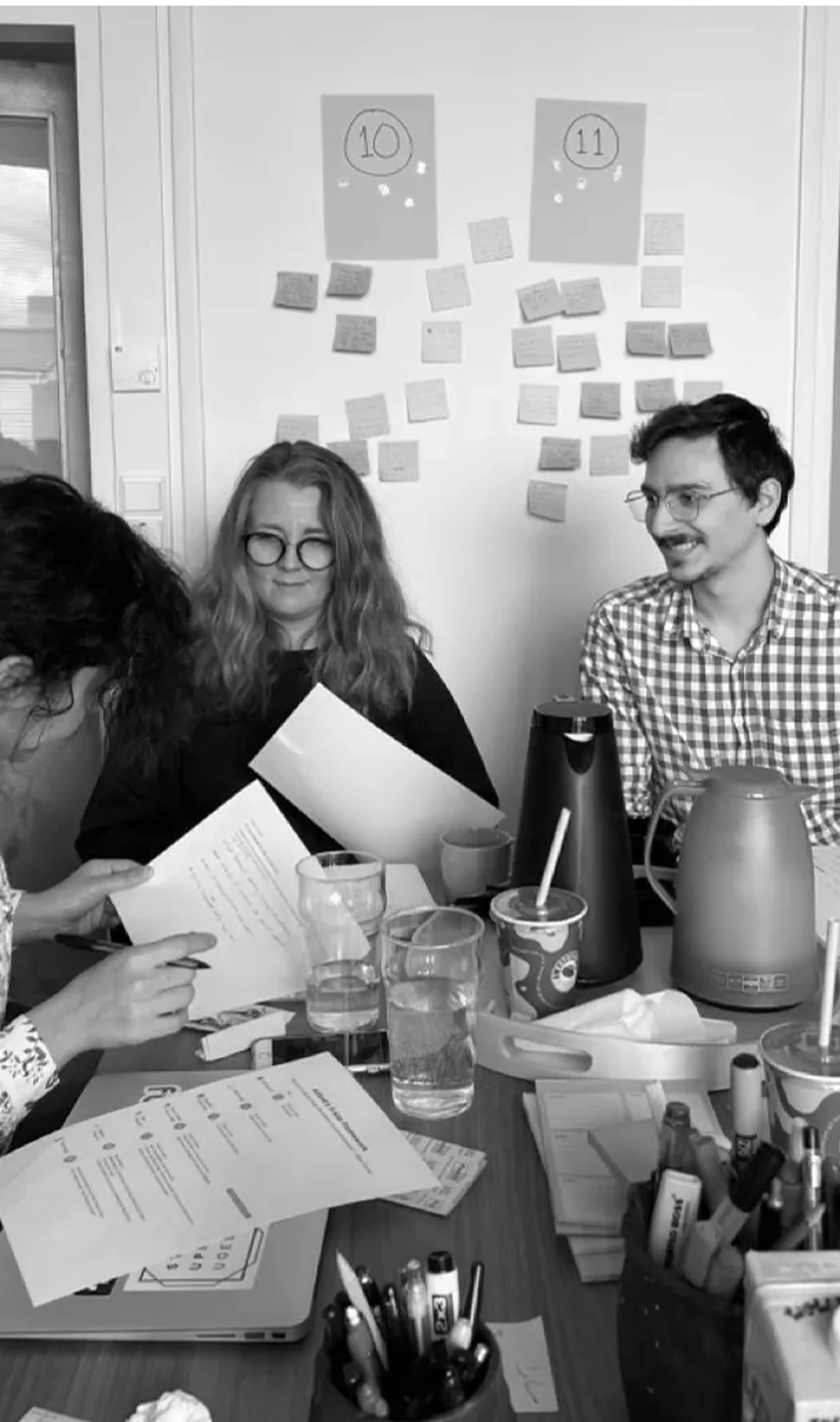 People sitting together discussing and workshopping