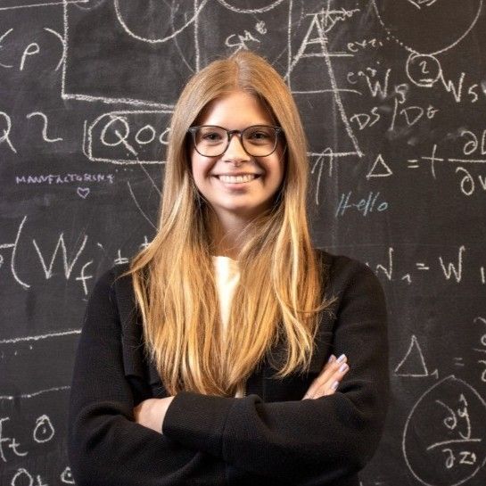 Woman with glasses with long blond hair