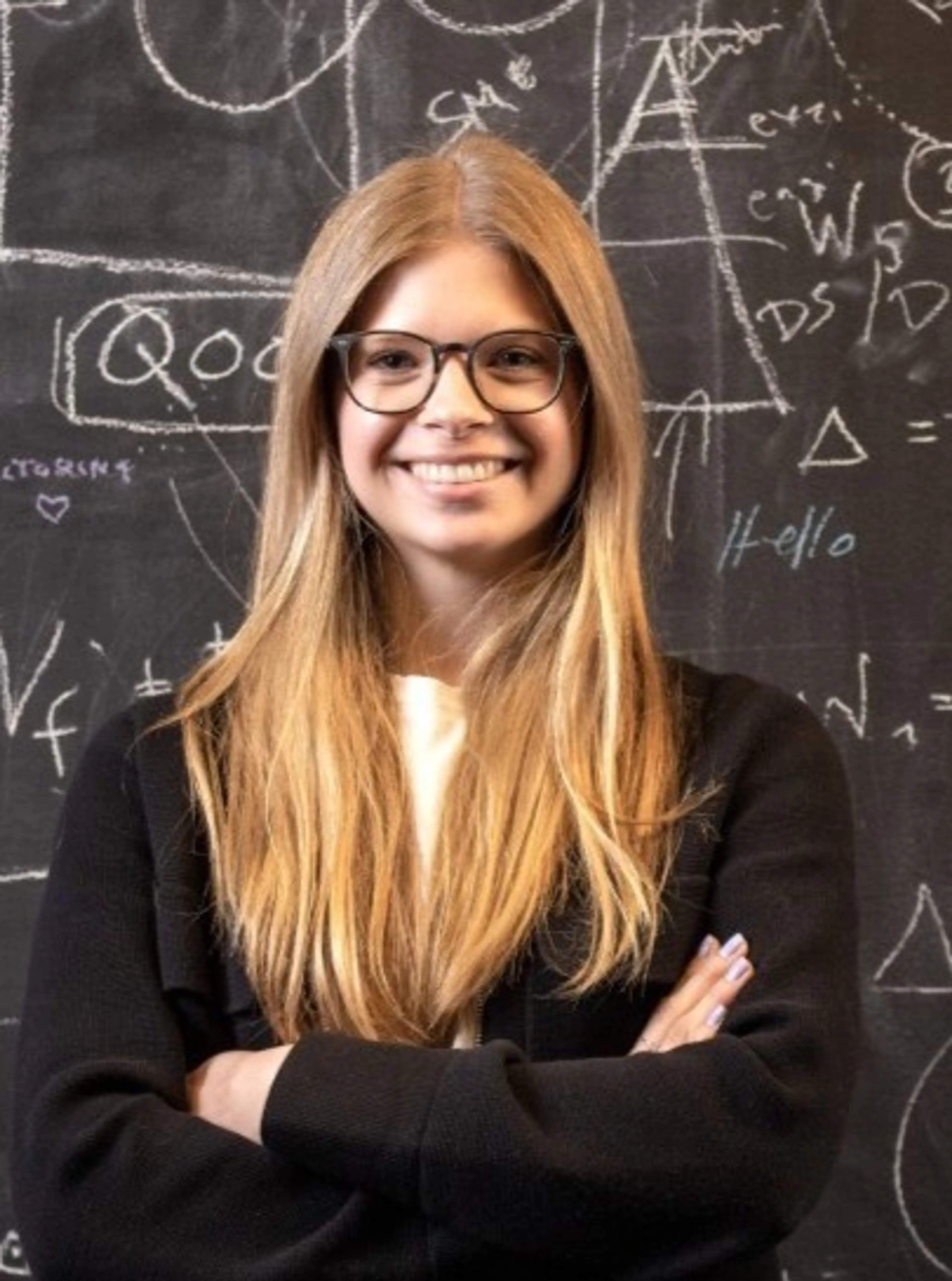Woman with glasses with long blond hair