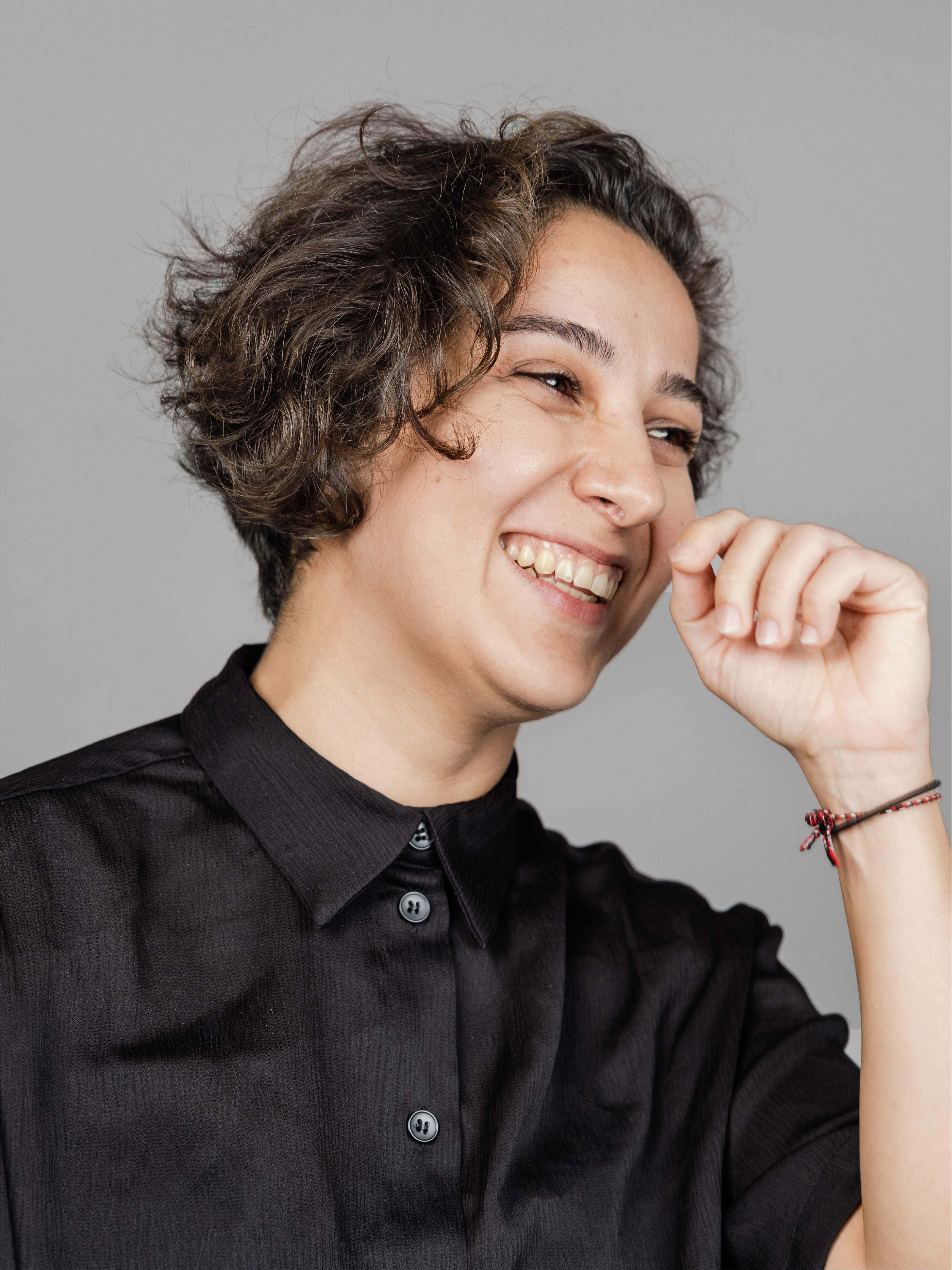 Woman laughing facing right