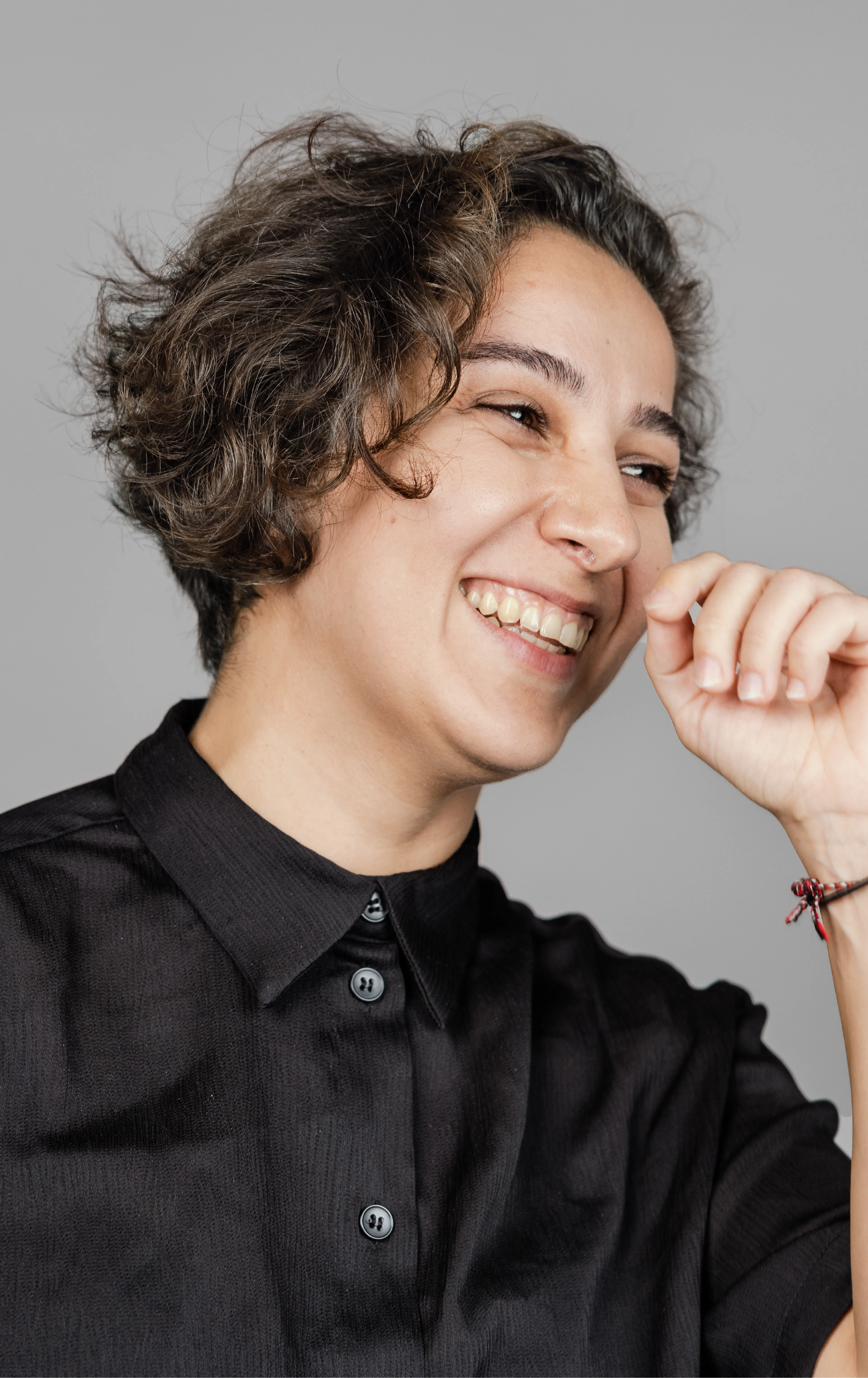 Woman laughing facing right