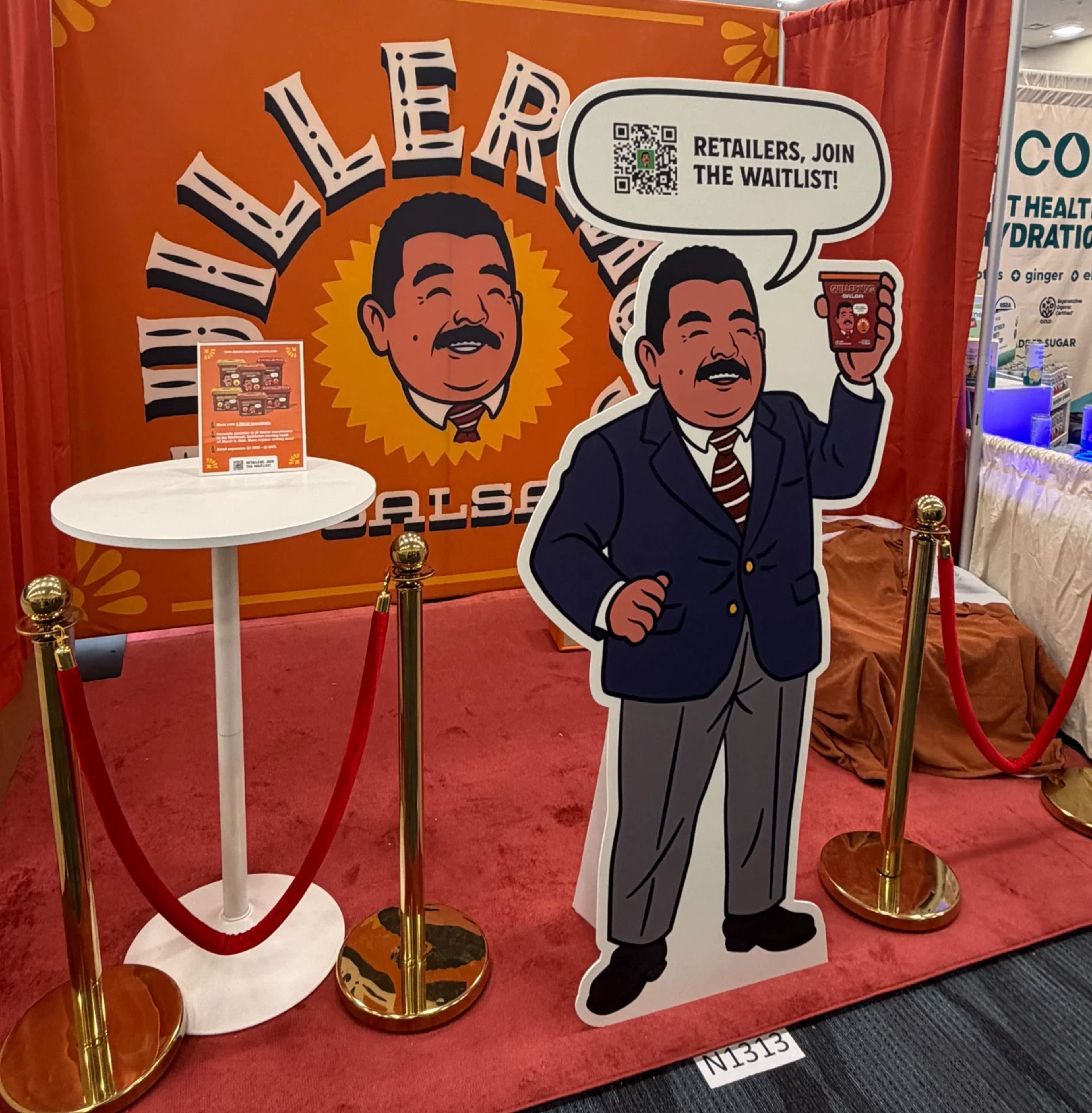 Miller's Salsa uses a life-size character cutout at a trade show with "Retailers, Join the Waitlist!"