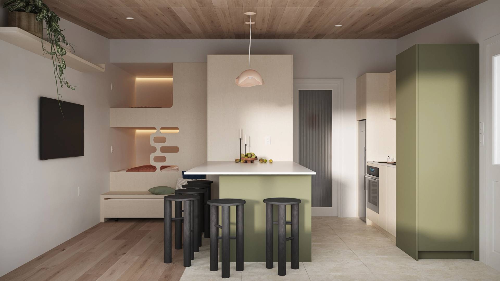 Cuisine verte et bois avec lit superposées avec accent de couleur rose pâle au dosseret et aux luminaires suspendus. Banc de bois noir