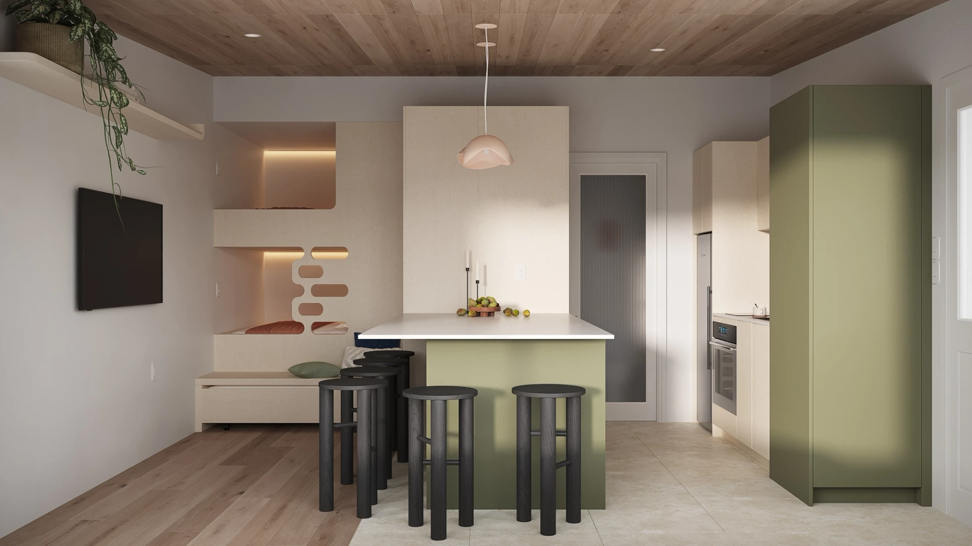 Cuisine verte et bois avec lit superposées avec accent de couleur rose pâle au dosseret et aux luminaires suspendus. Banc de bois noir