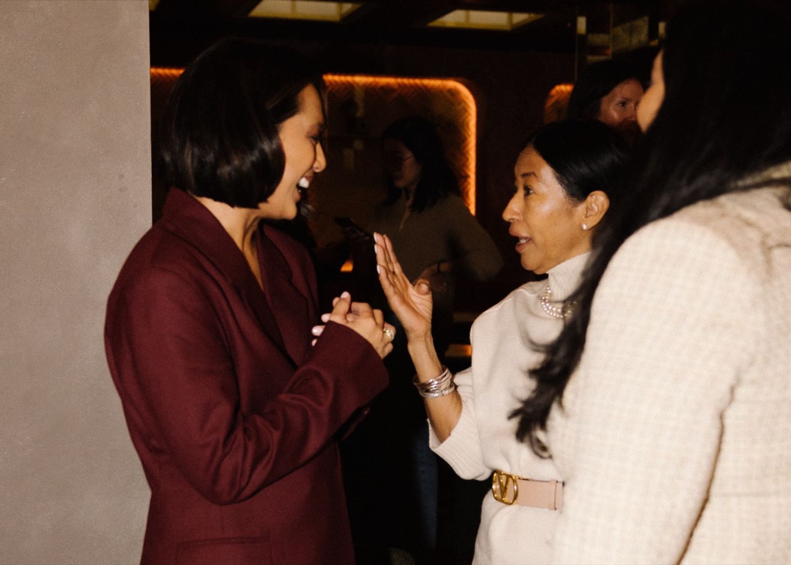 Jeanelle greeting members at the event