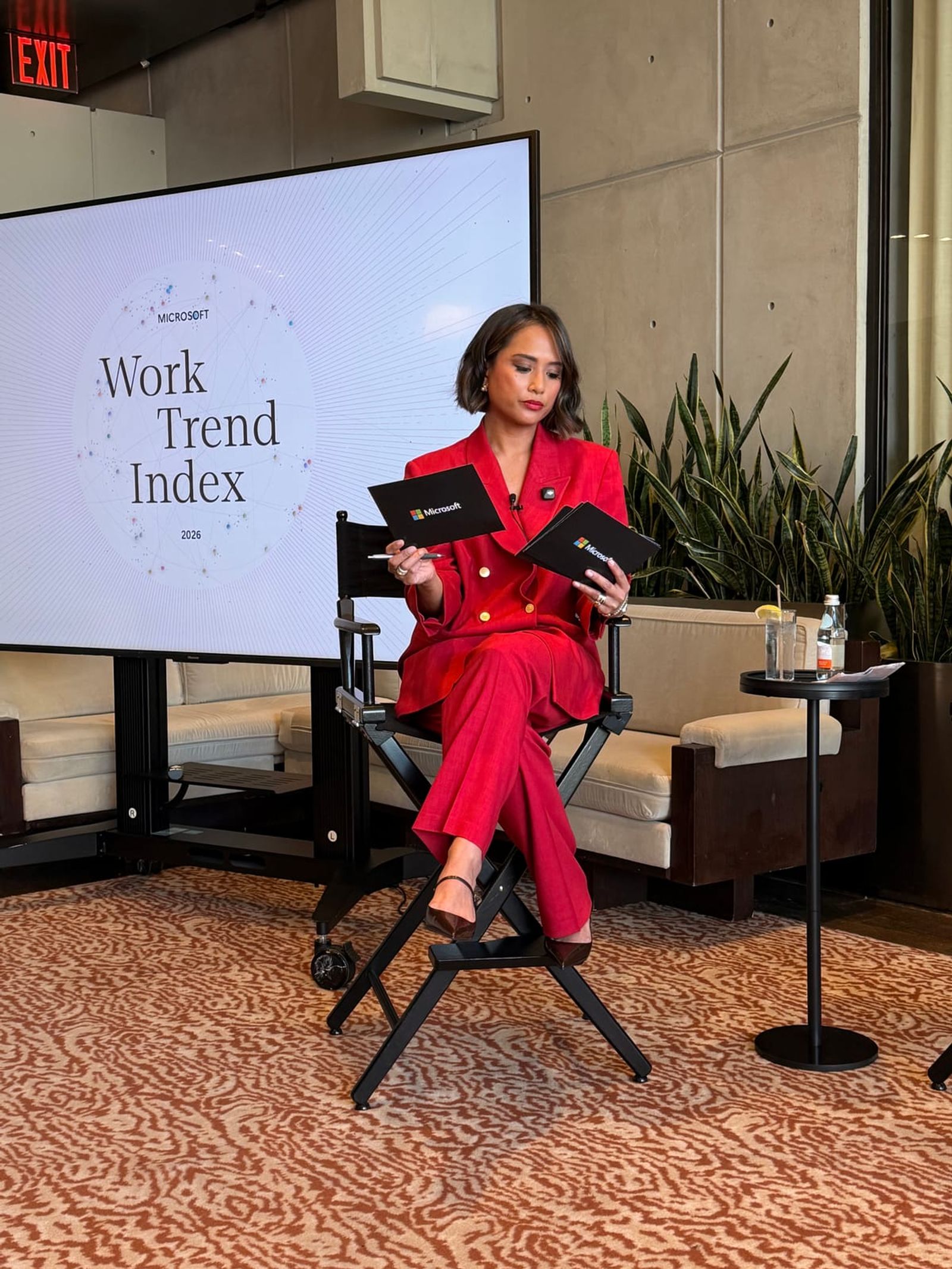 Jeanelle reviewing her notes in front of the Work Trend Index screen