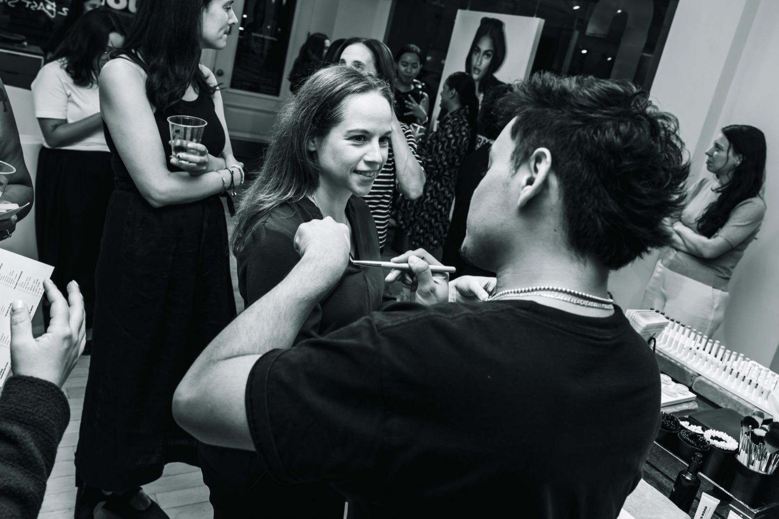 A member getting a touch-up from a Jones Road artist