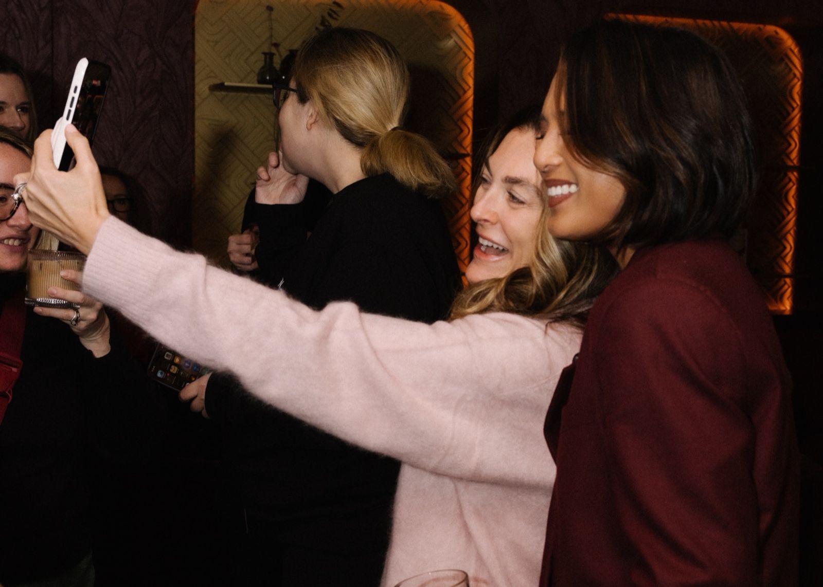 Jeanelle and a guest taking a selfie