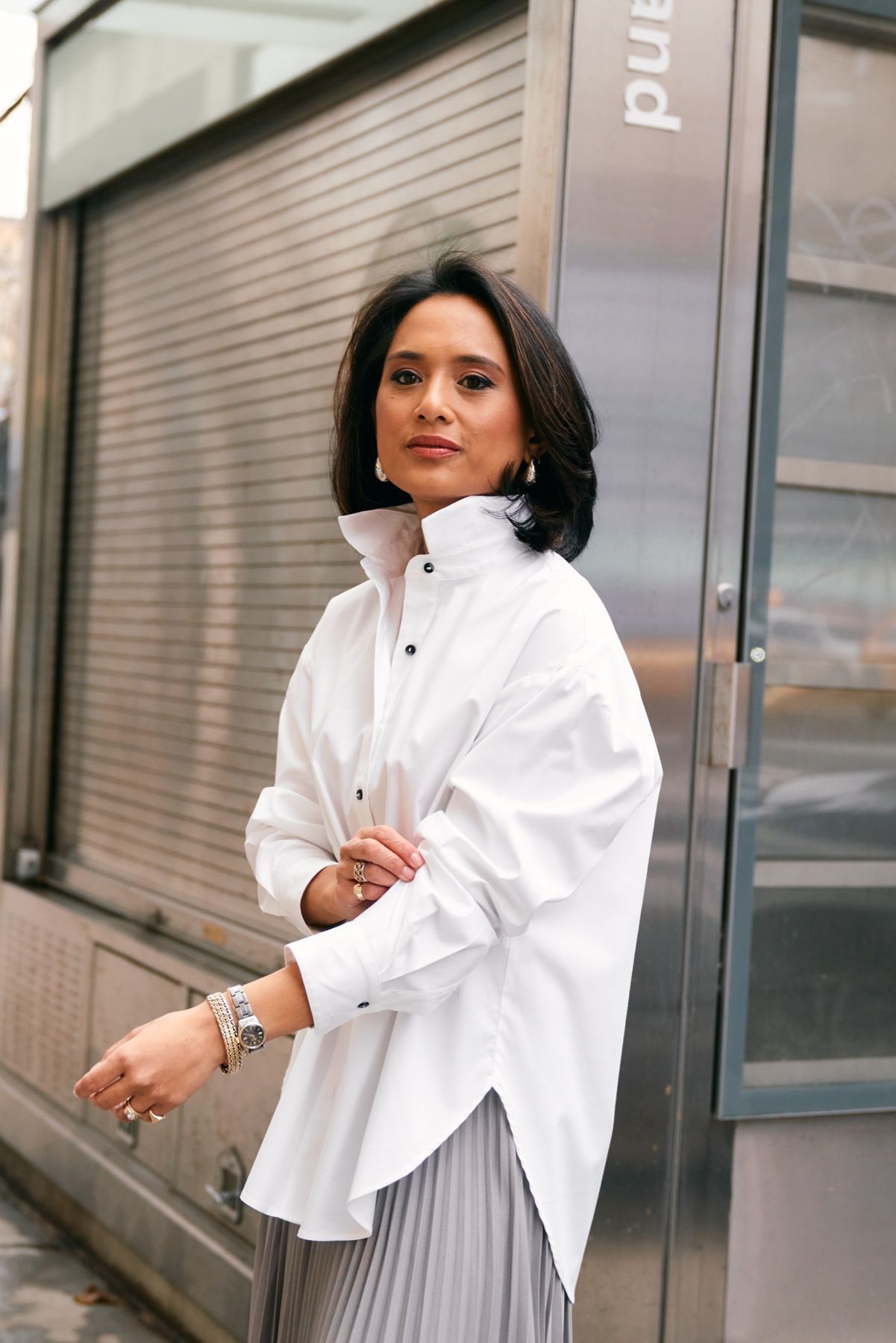 Jeanelle in a white shirt on a New York street