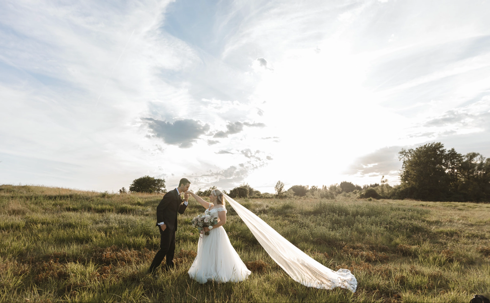 Couple celebrating in the open landscape at FireRock