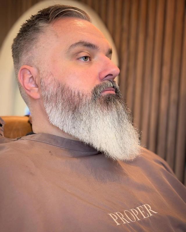 Long grey beard, sculpted, with a faded undercut