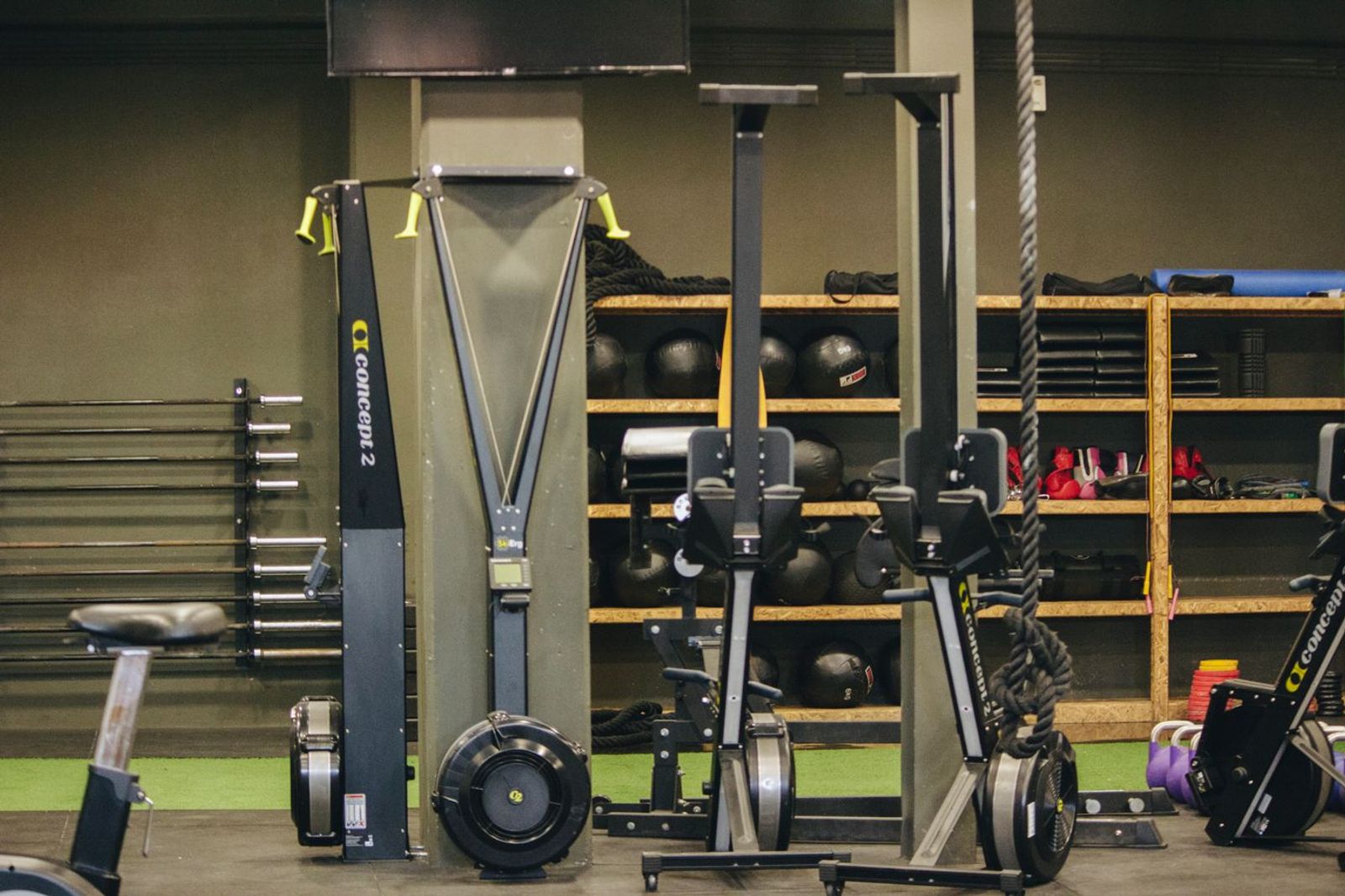 Rowing machines, medicine balls and functional training equipment in a gym