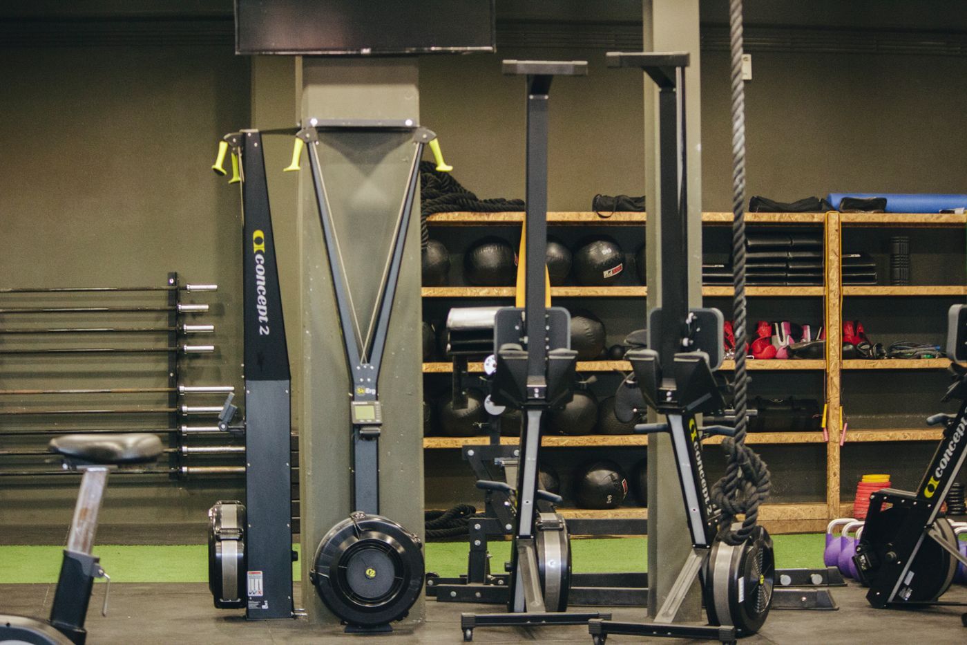 Rowing machines, medicine balls and functional training equipment in a gym