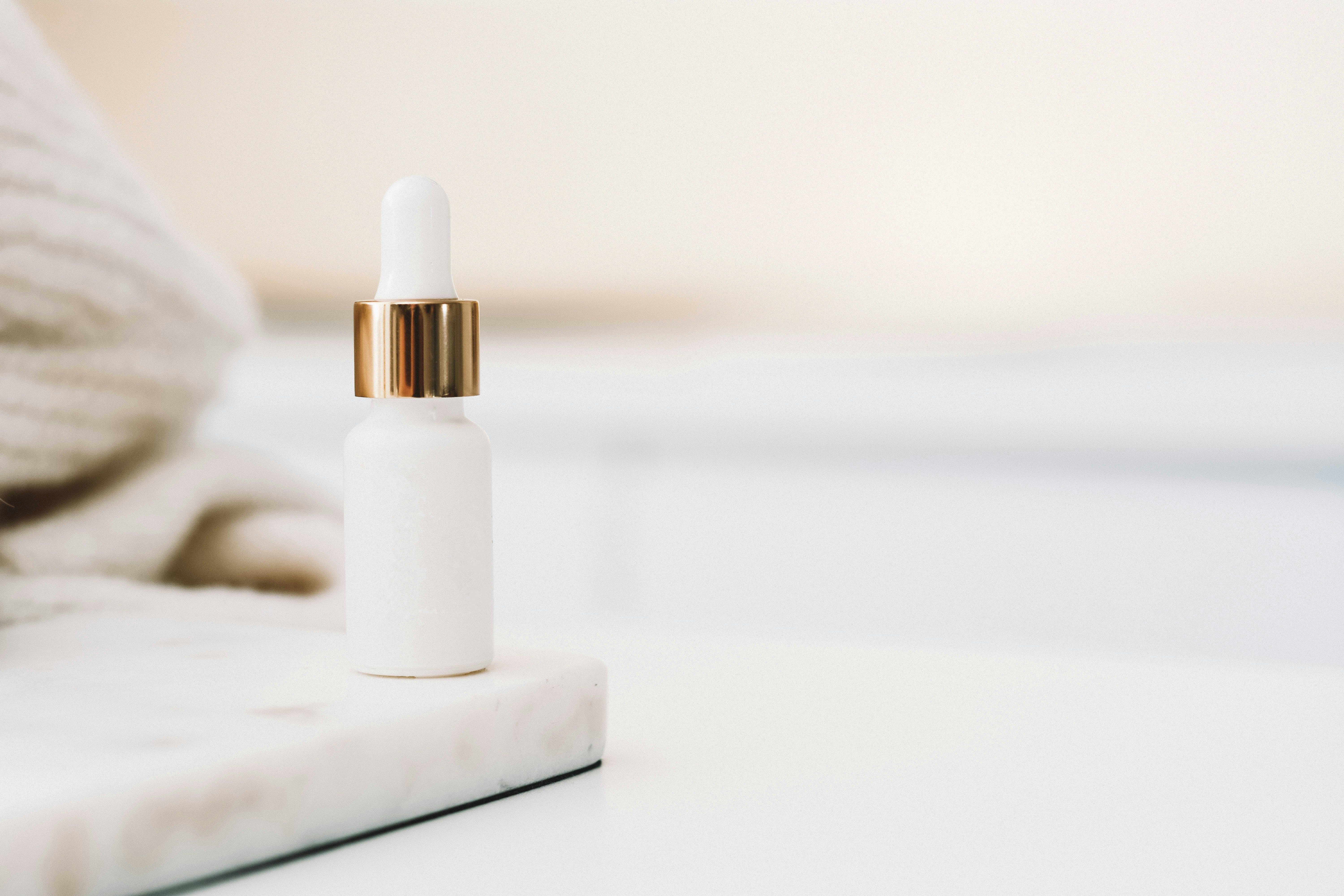 Medical grade skincare serum bottle on clean white surface
