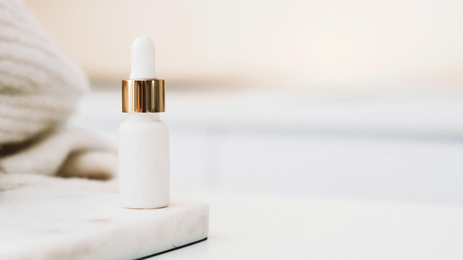 Medical grade skincare serum bottle on clean white surface