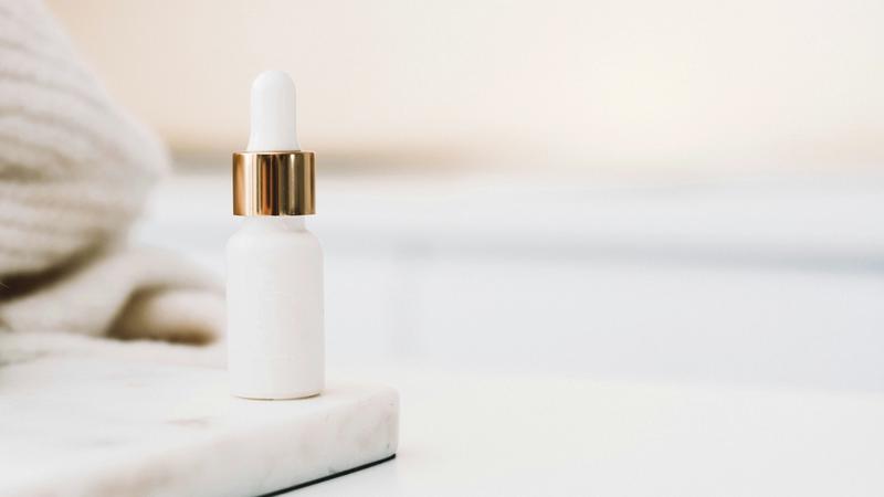 Medical grade skincare serum bottle on clean white surface