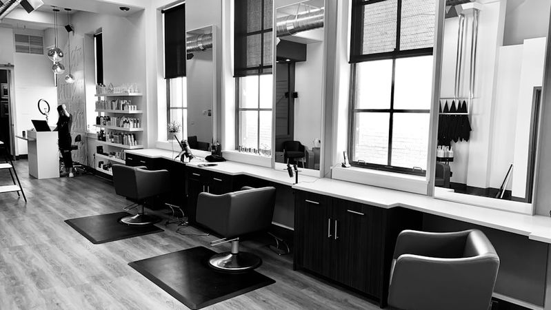 Professional beauty salon interior with treatment stations for brow and lash care