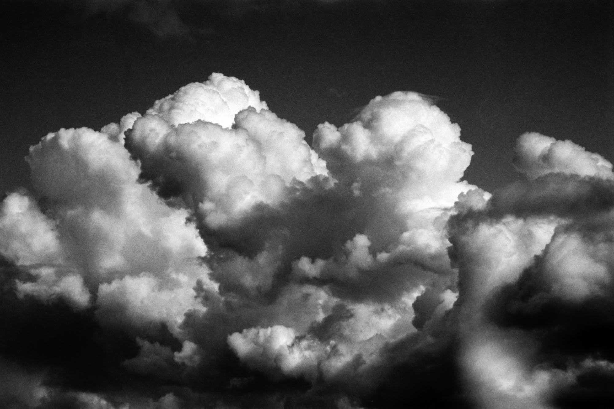 Breath taking view of clouds in the sky. Black and white picture.
