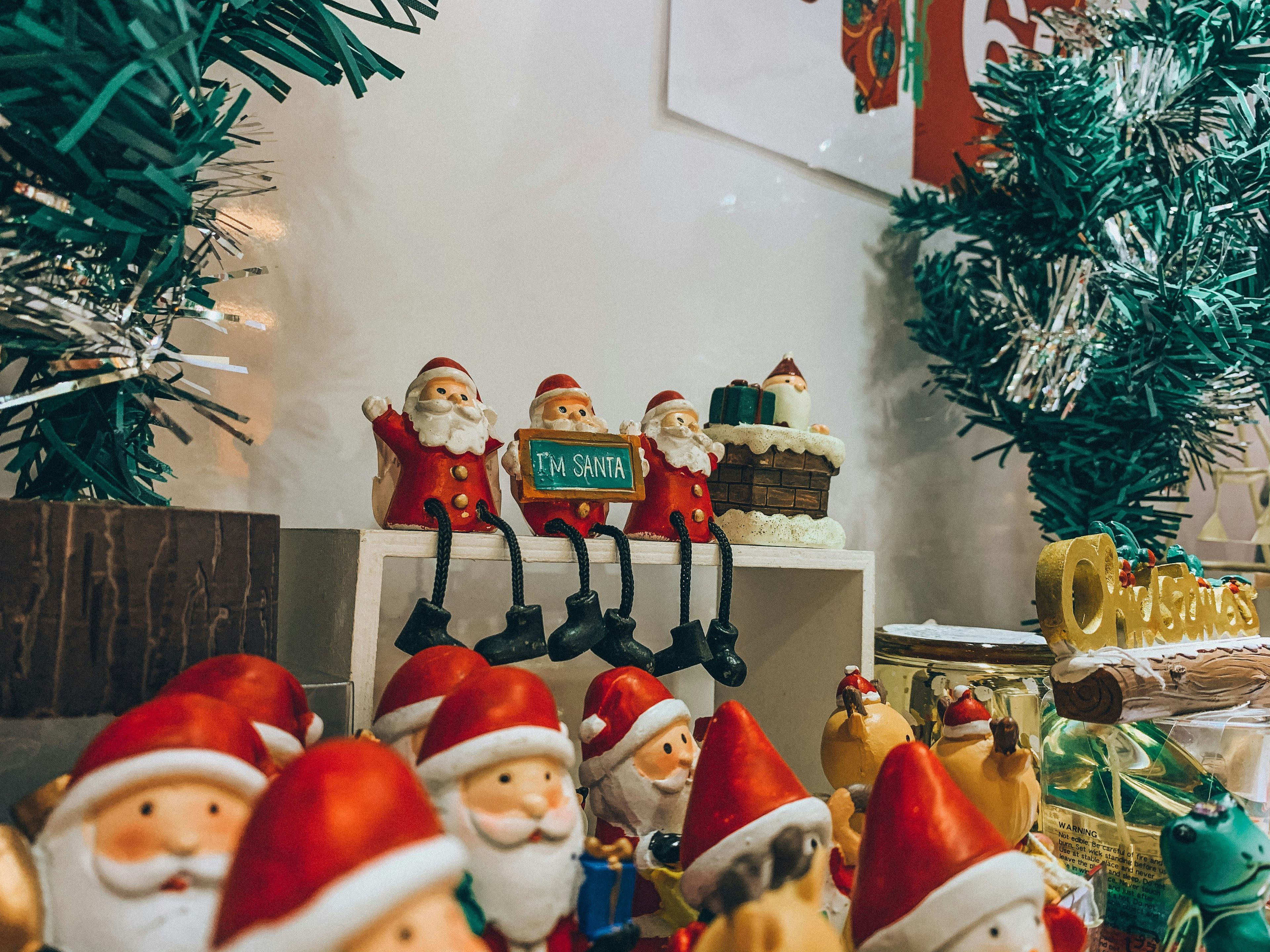 red and white santa claus figurine