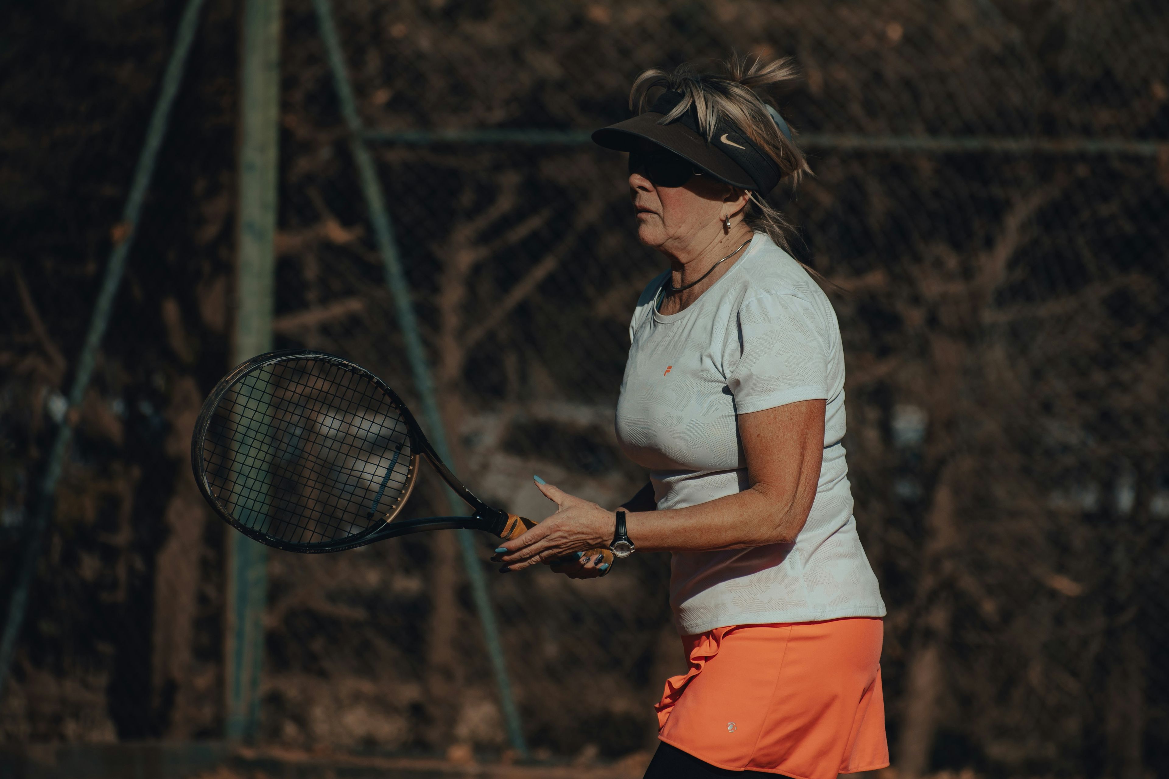 a person holding a tennis racket