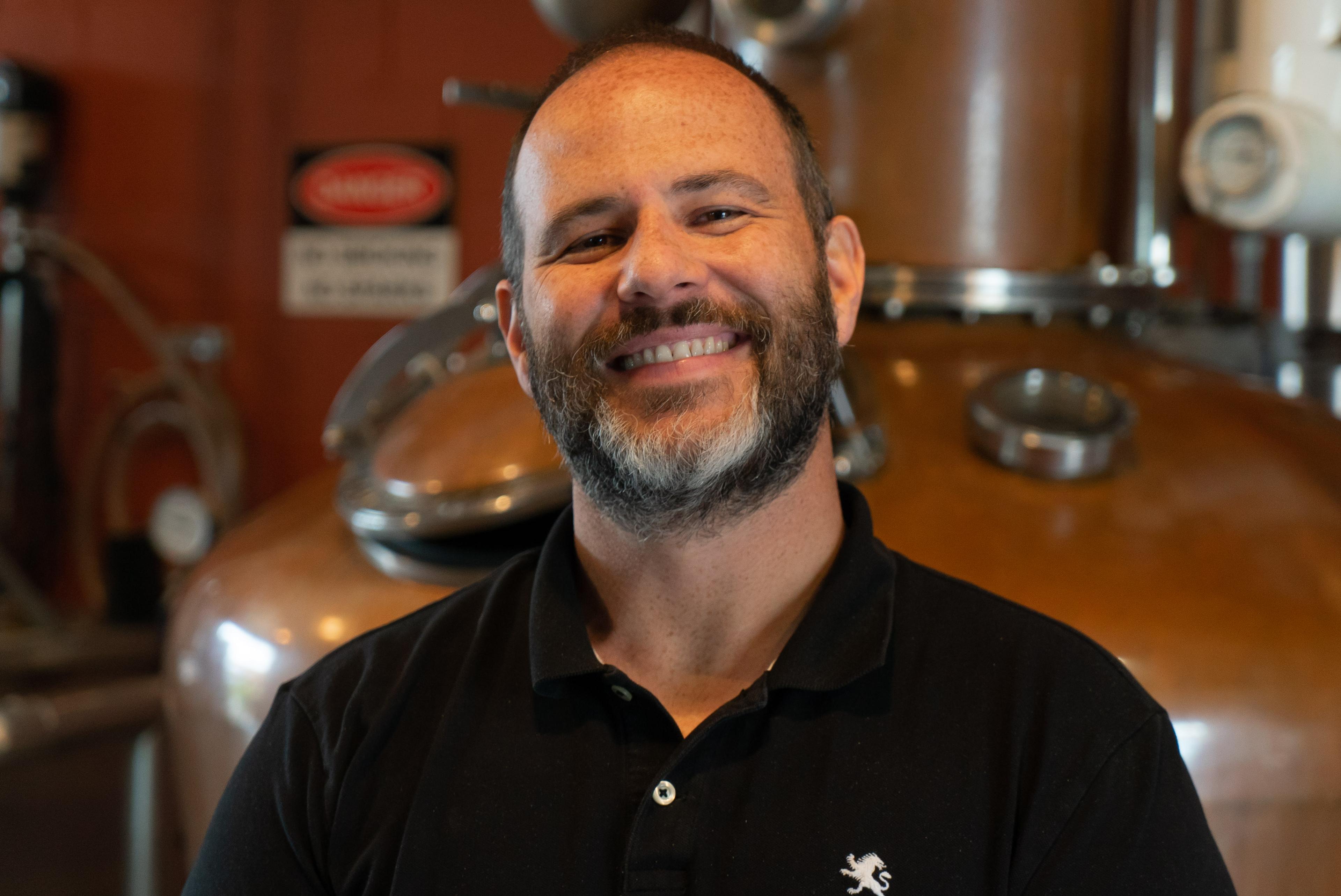 Jeremy Dever in front of a still