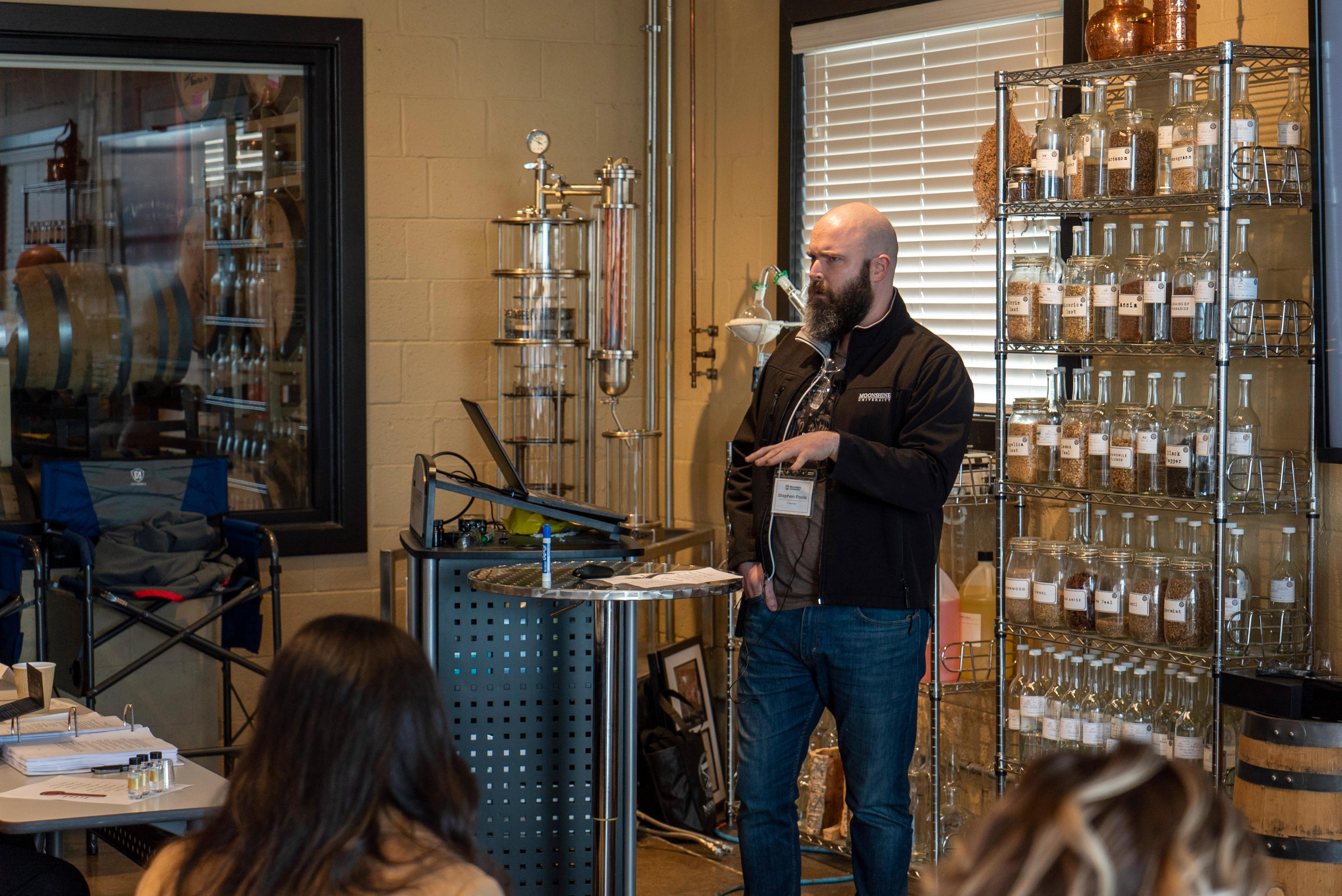 Stephen Poole teaching in classroom