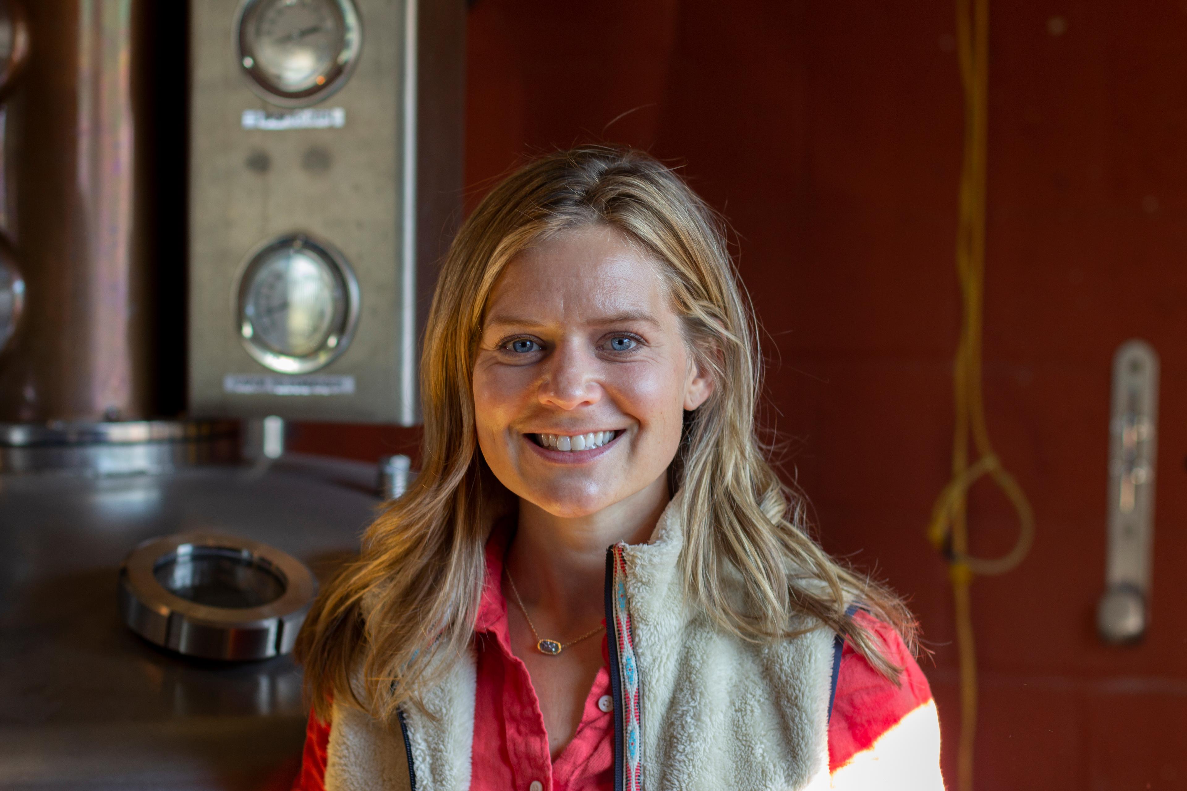 Elizabeth McCall in front of still