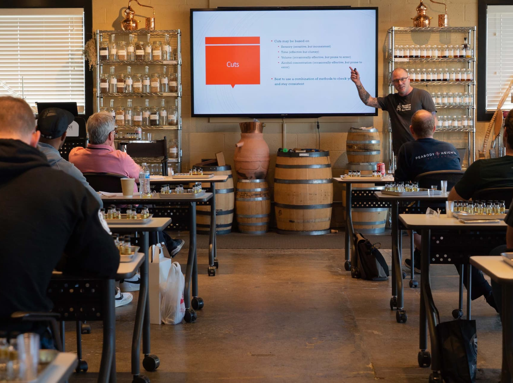 A Moonshine University instructor guiding a class through a slide deck