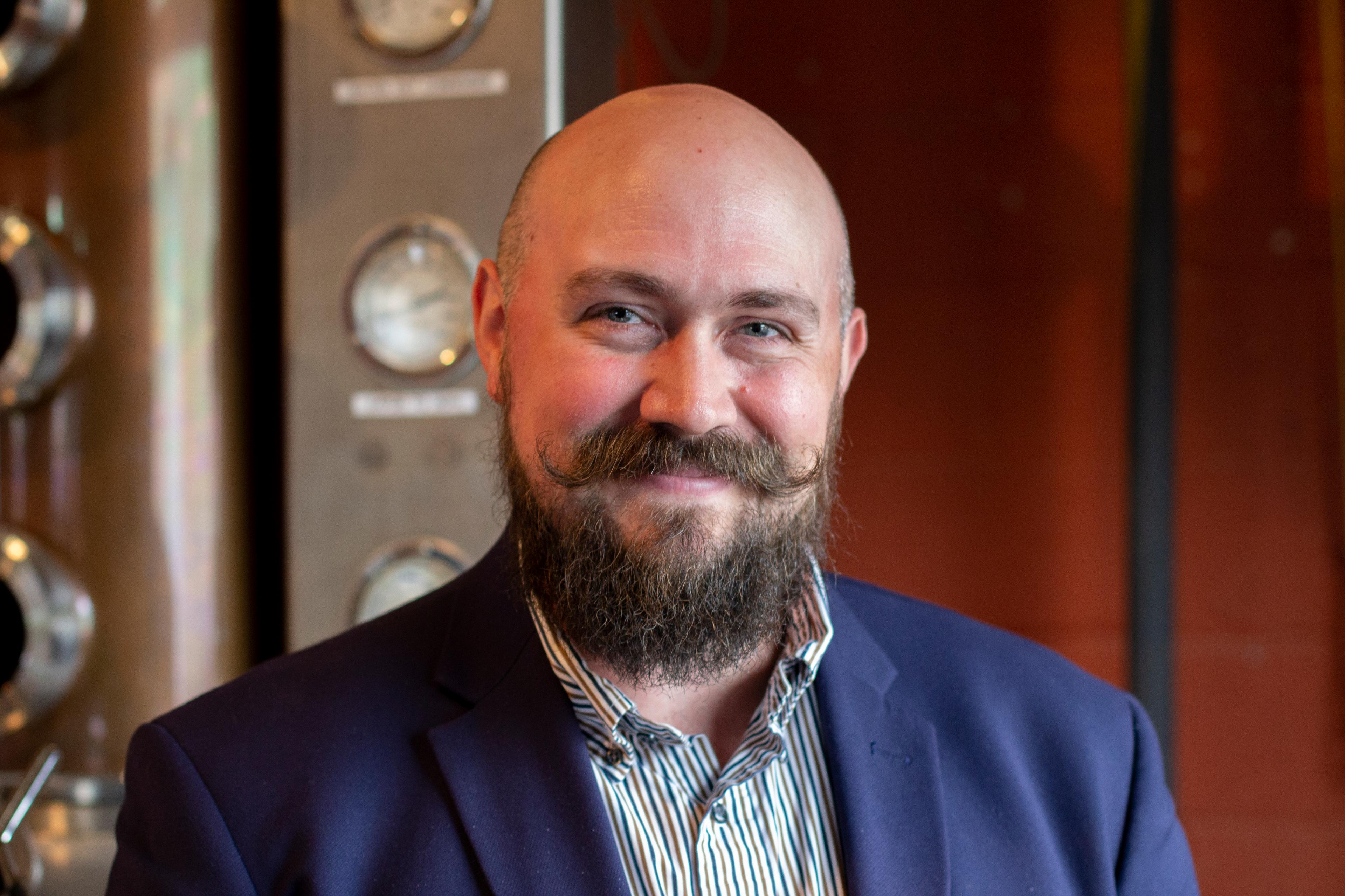 David Carpenter in front of a still
