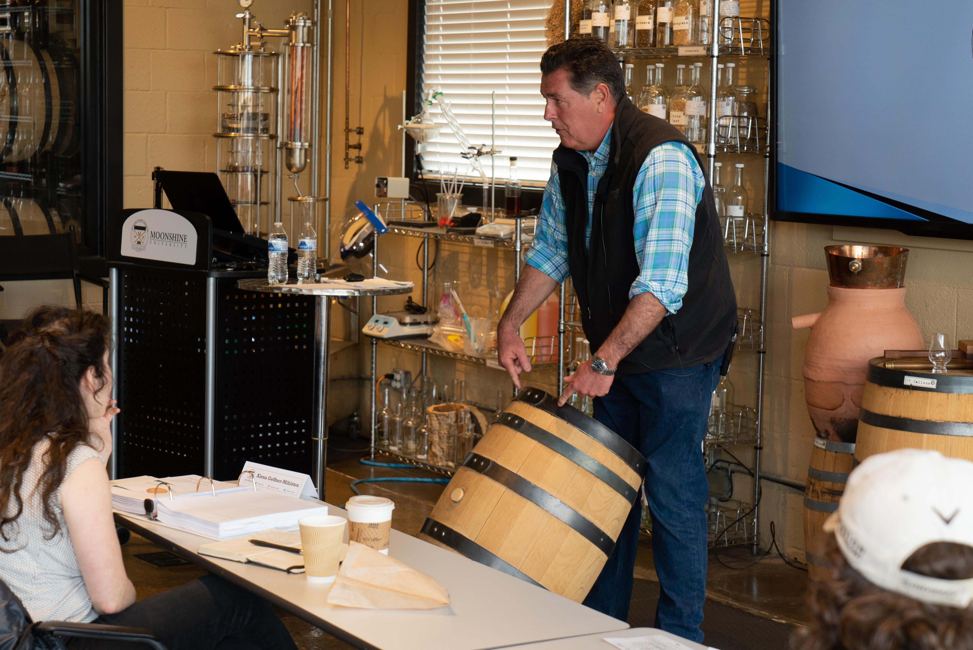 Paul explaining a whiskey barrel