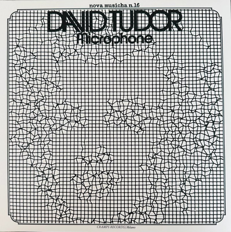 Front sleeve of David Tudor’s Microphone (Cramps Records, 1978), with the title over a black grid fractured into irregular polygonal patches.