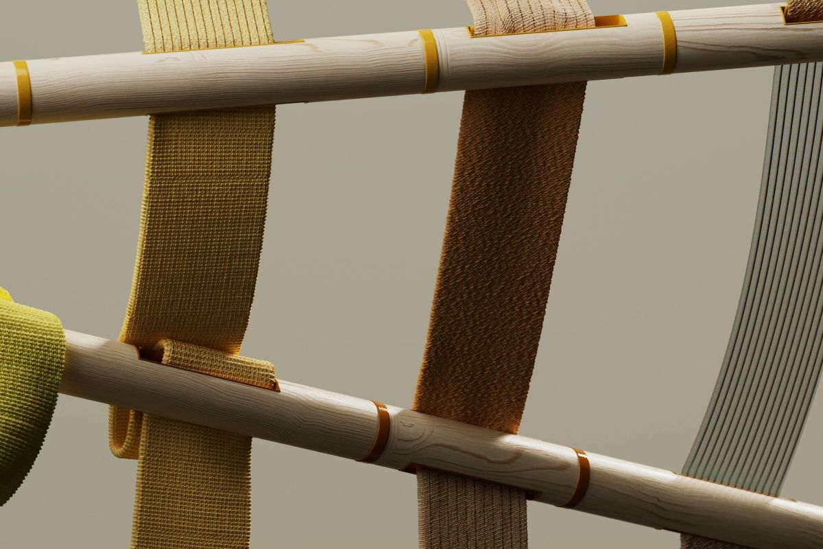 thick woven bands of shorter and longer fabric stretched between two wooden poles