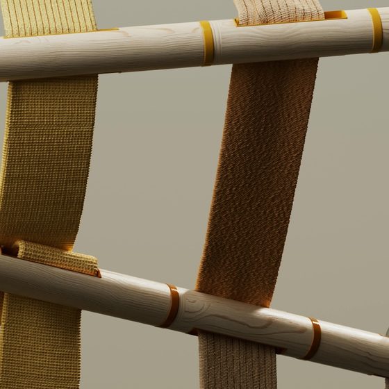 thick woven bands of shorter and longer fabric stretched between two wooden poles