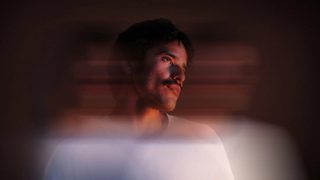 Blurred motion photo of man in white shirt