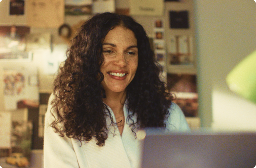 Man in blue collared shirt with glasses on
