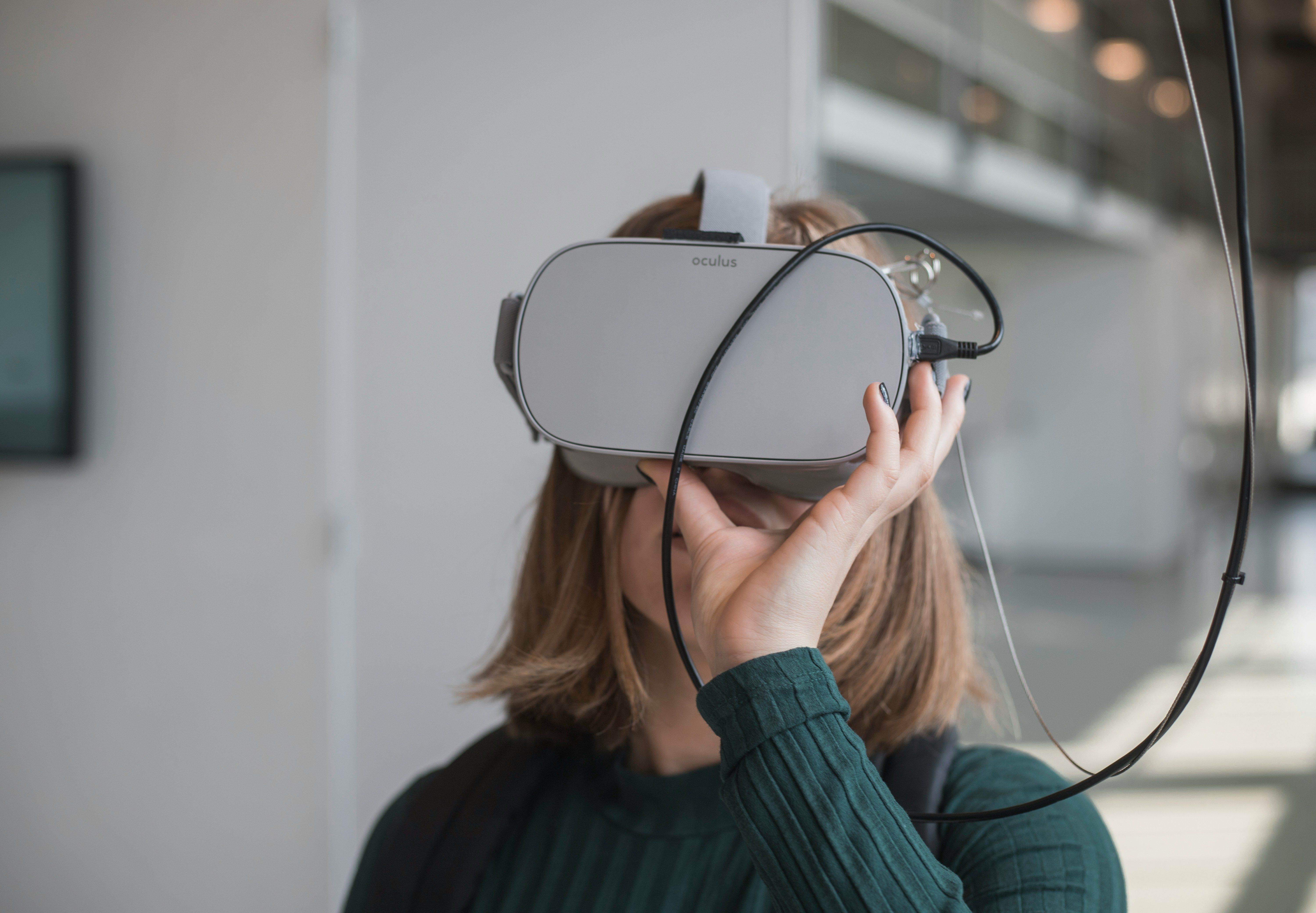 Person wearing a VR headset indoors