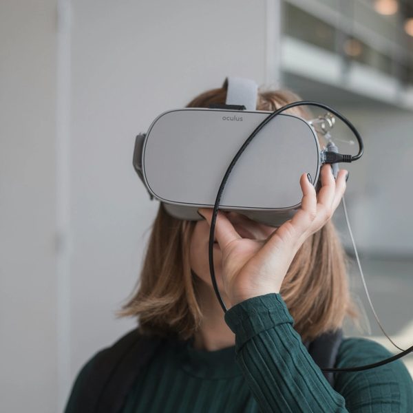 Person wearing a VR headset indoors