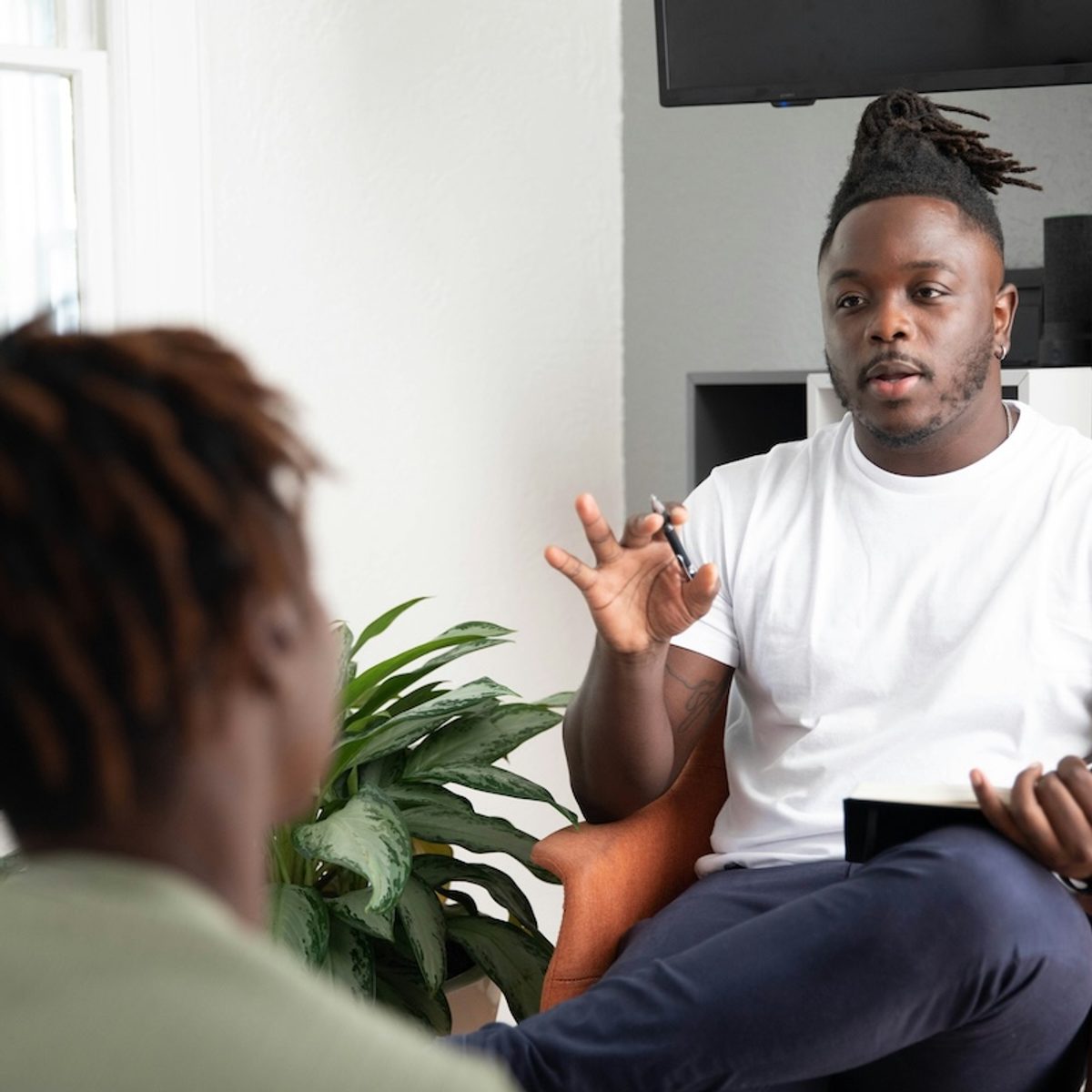 A therapist in session with a client