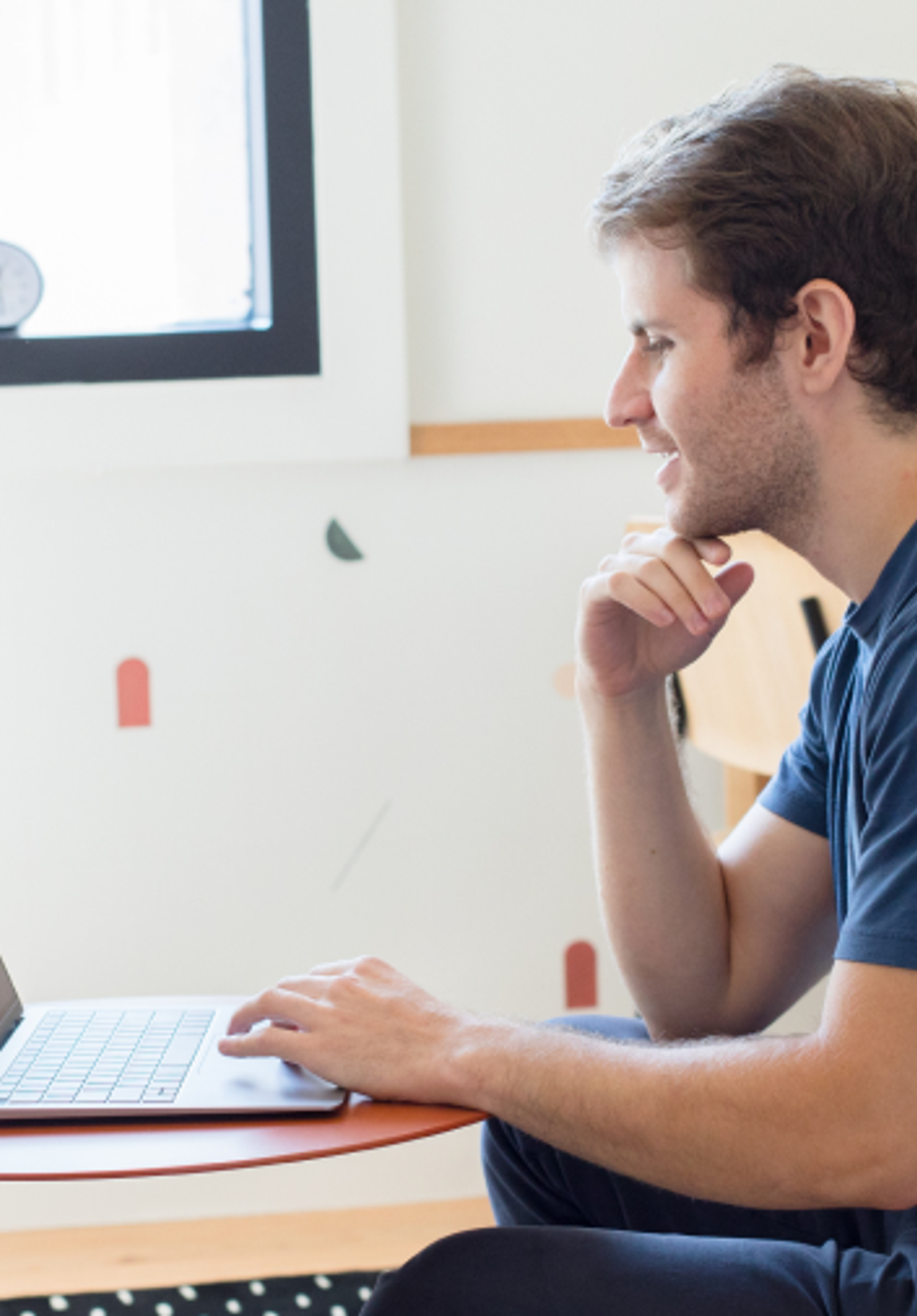 online therapist conducting a session on laptop