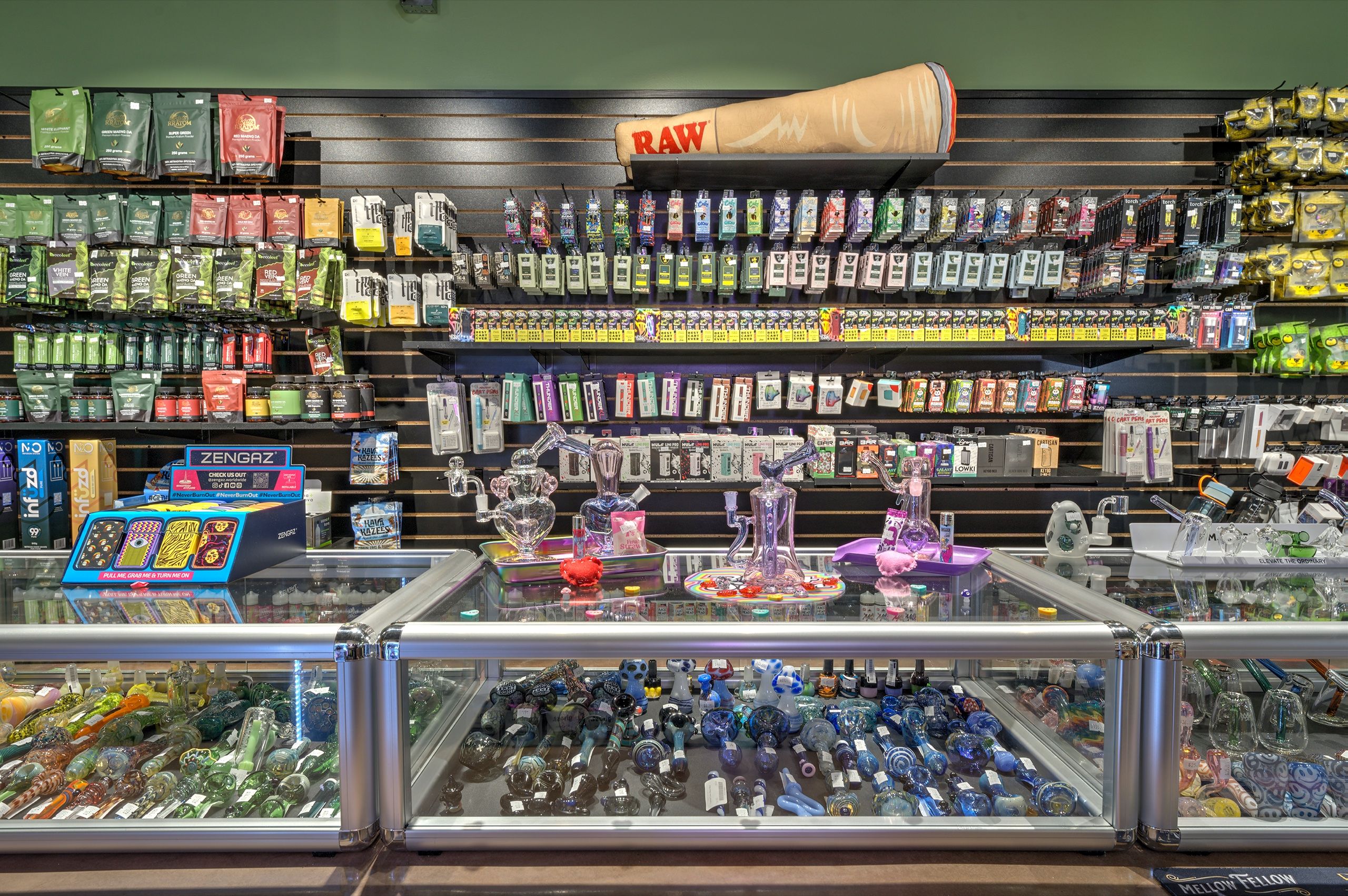 Glass case of hand pipes below the RAW display wall