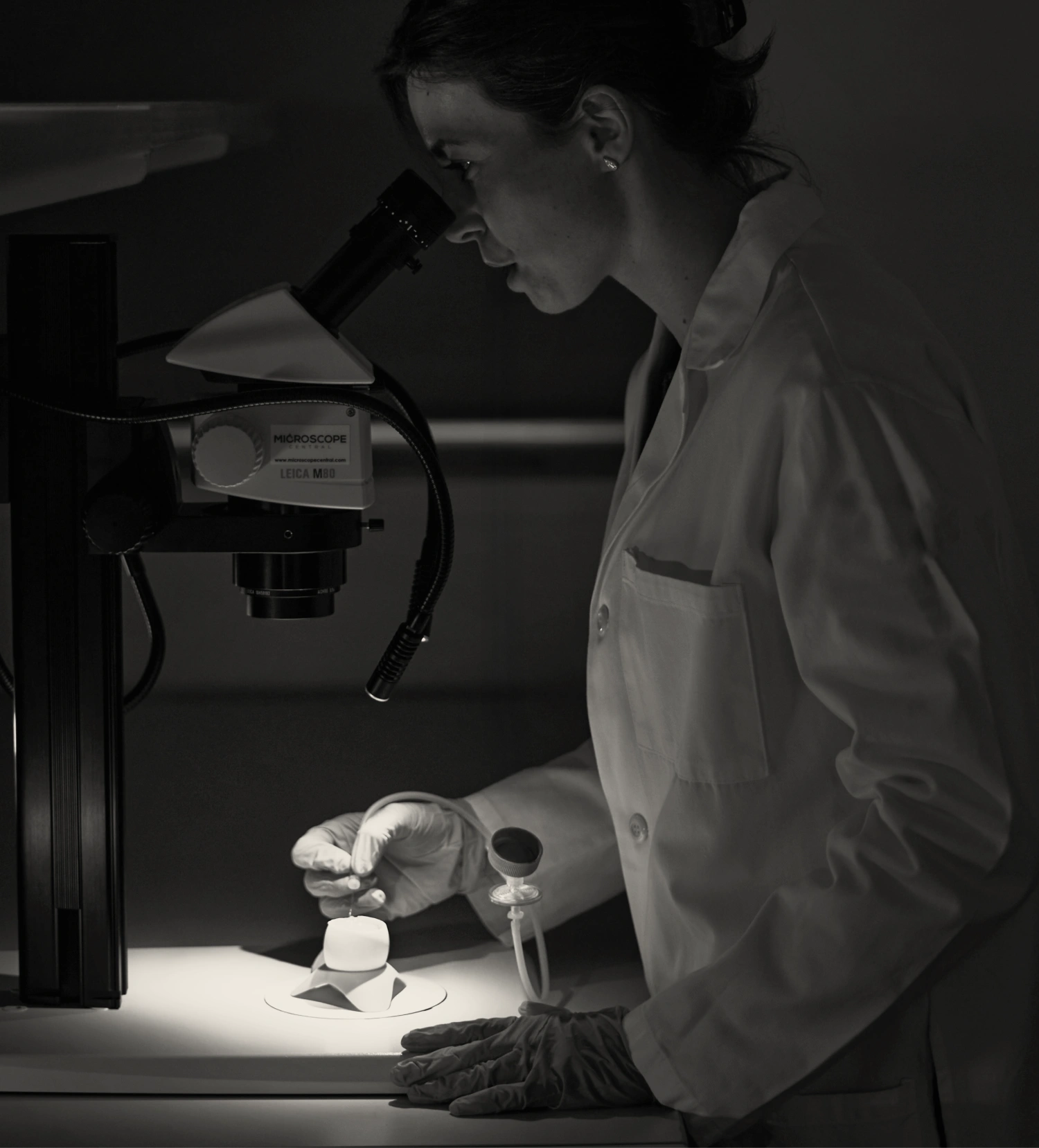 Neion Bio scientist in the lab with an egg experiment