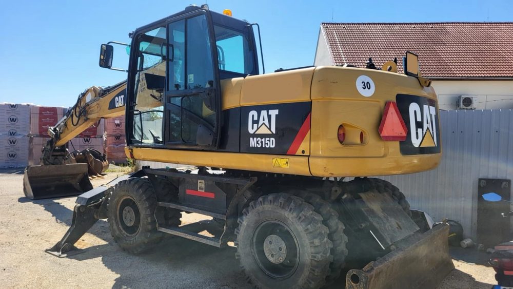 Caterpillar M315D - deaktivace SCR a DPF
